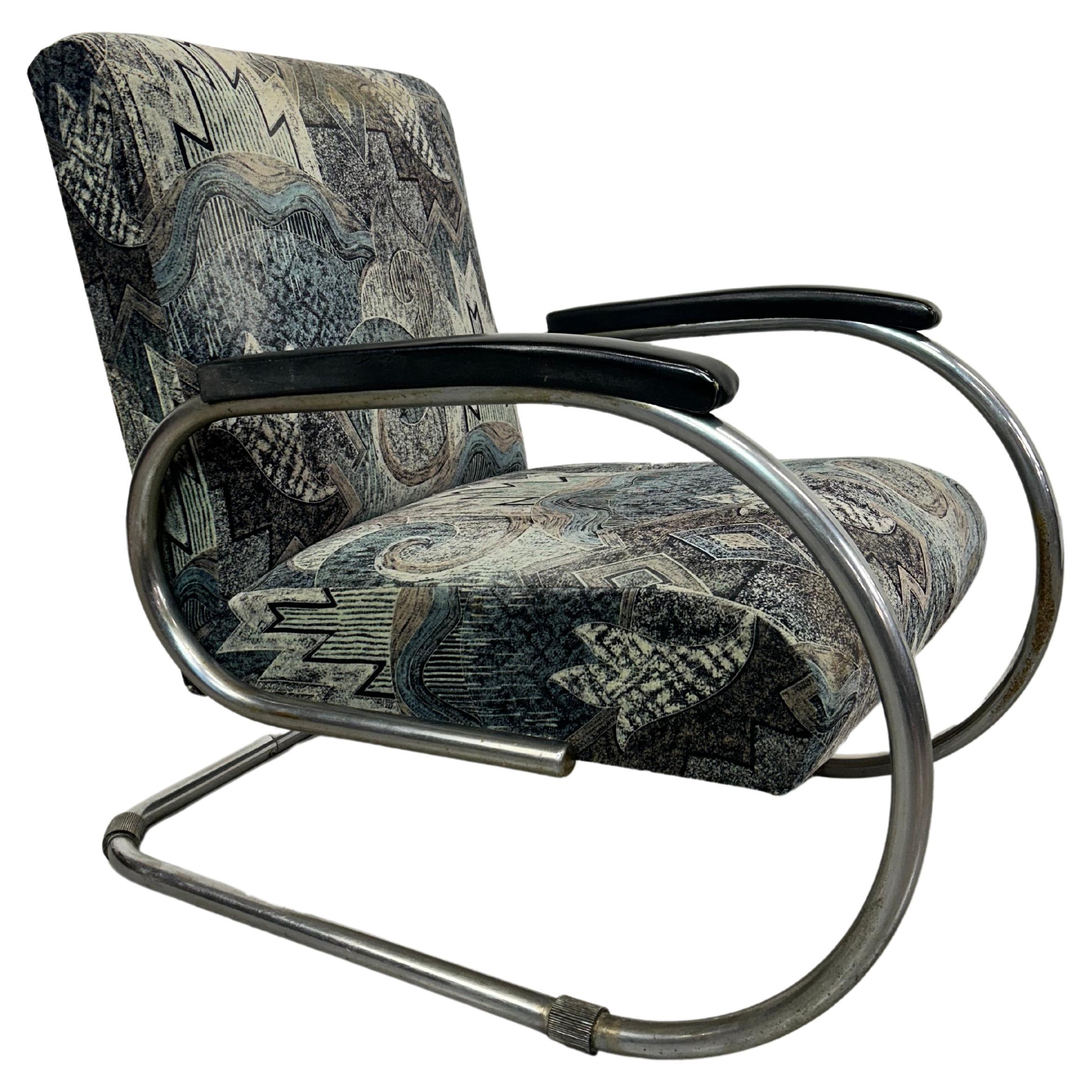 Tubular steel armchair by Tubax For Sale
