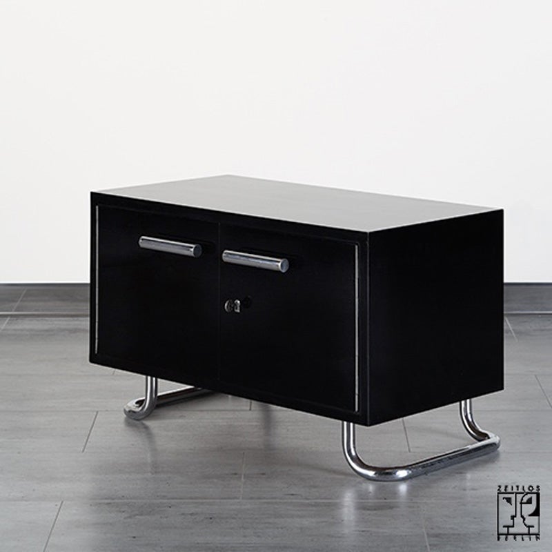 The offered Bauhaus cabinet was manufactured by the famous Modernist  furniture manufactory Hynek Gottwald in the 1930s. It has been refurbished in a restoring workshop by craftsmen that are still able to work in the specific quality of the modern
