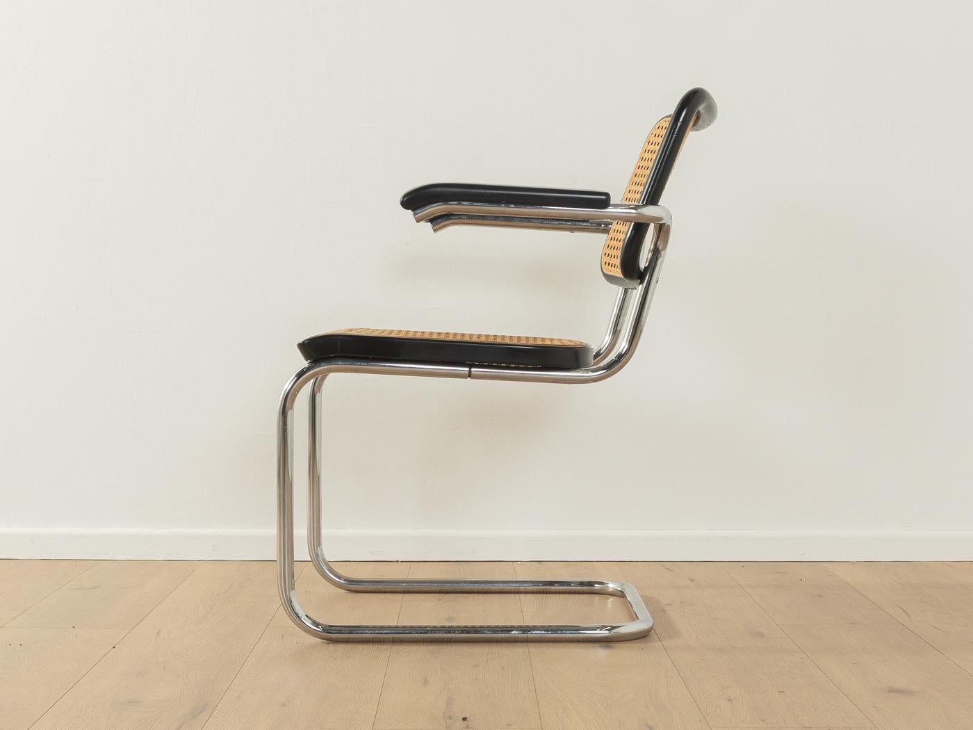 Legendary tubular steel chair, model S 64, designed by Marcel Breuer for Thonet (1928). Solid frame made of chromed tubular steel. The seat and backrest are covered with the original 