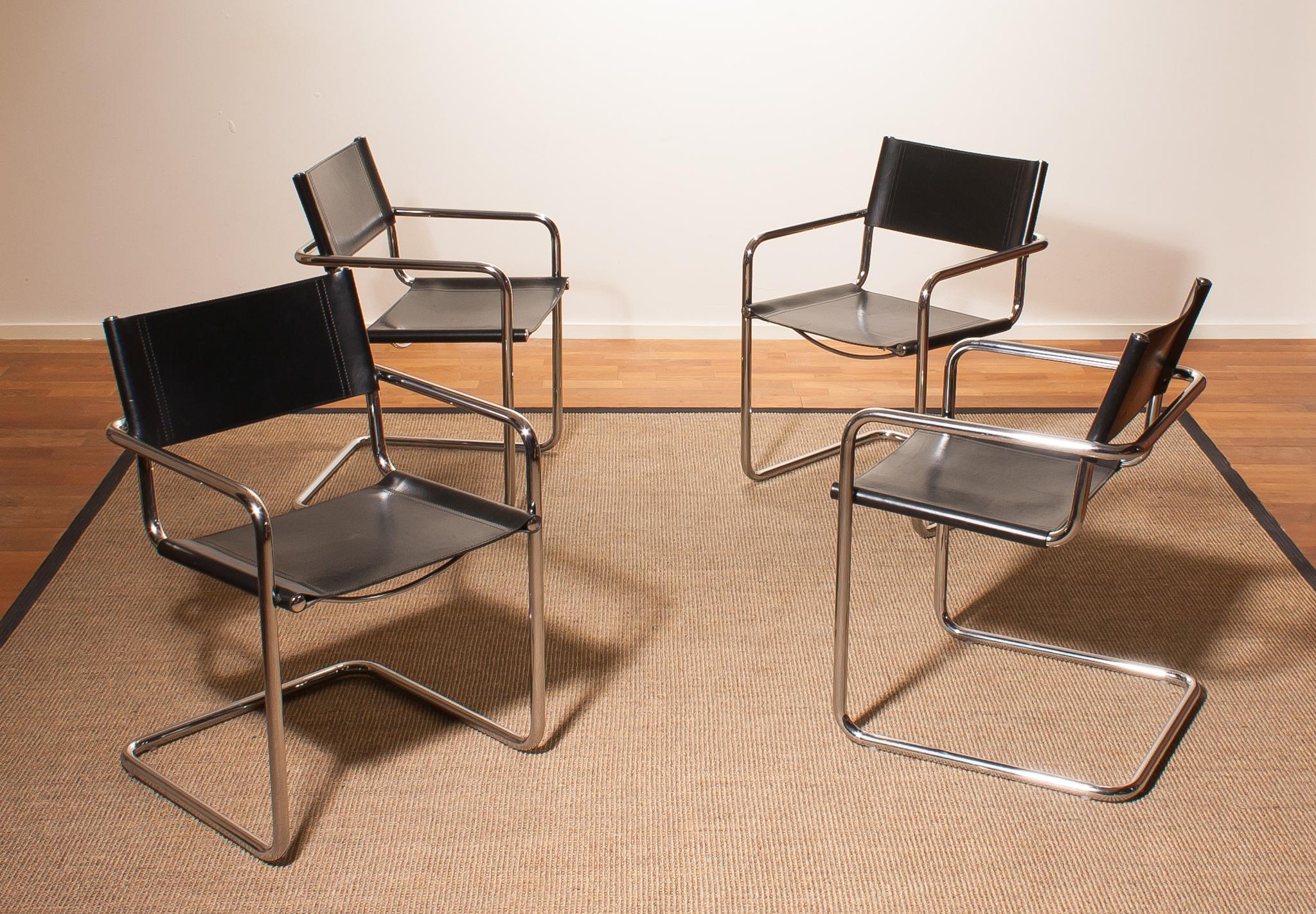 A beautiful set of four dining chairs made by Matteo Grassi, Italy.
The chairs have tubular chrome steel frames with sturdy black leather seating and backrest.
They are signed on the back of the backrest.
The chairs are in very nice