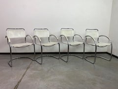 Tubular steel dining chairs