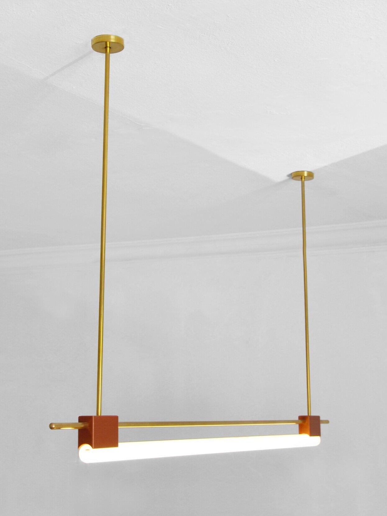 Tubus pendant by Contain
Dimensions: D 120 x W 100 (custom length) x H 3 cm 
Materials: brass and 3D printed PLA structure.
Available in different finishes. 

All our lamps can be wired according to each country. If sold to the USA it will be
