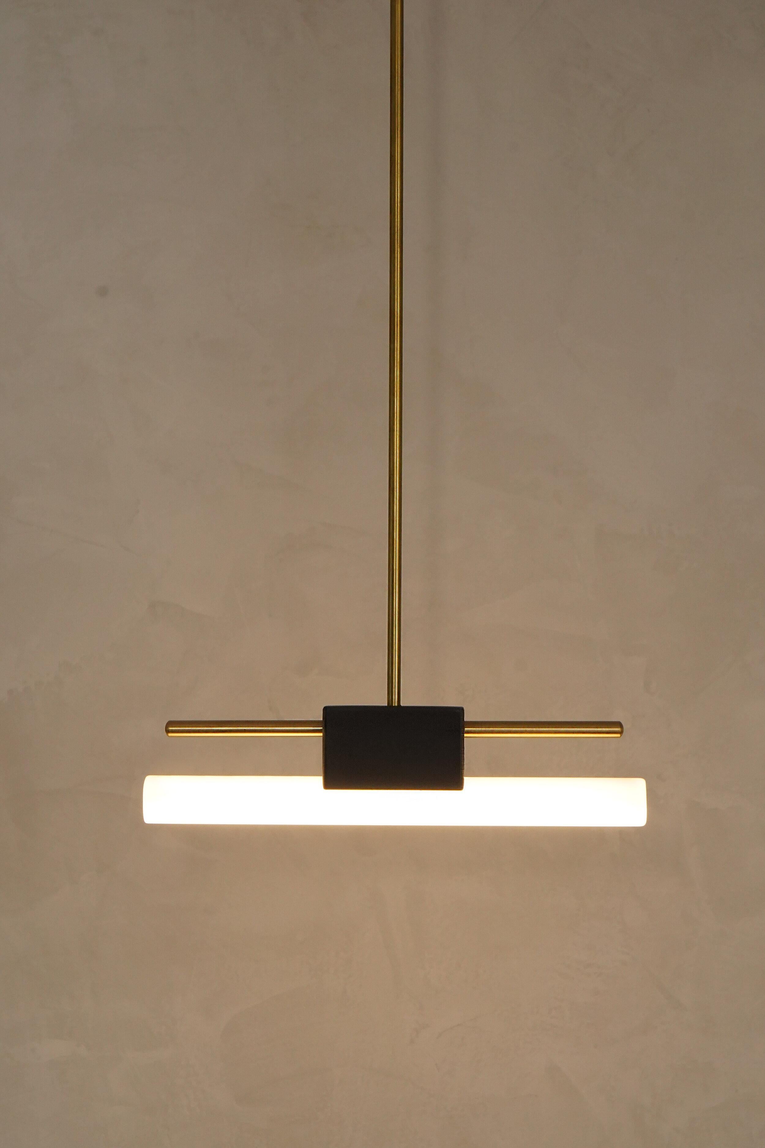 Tubus simple pendant by Contain
Dimensions: D50 x H100 (custom length) cm 
Materials: Brass and 3D printed PLA structure.
Available in different finishes.

All our lamps can be wired according to each country. If sold to the USA it will be