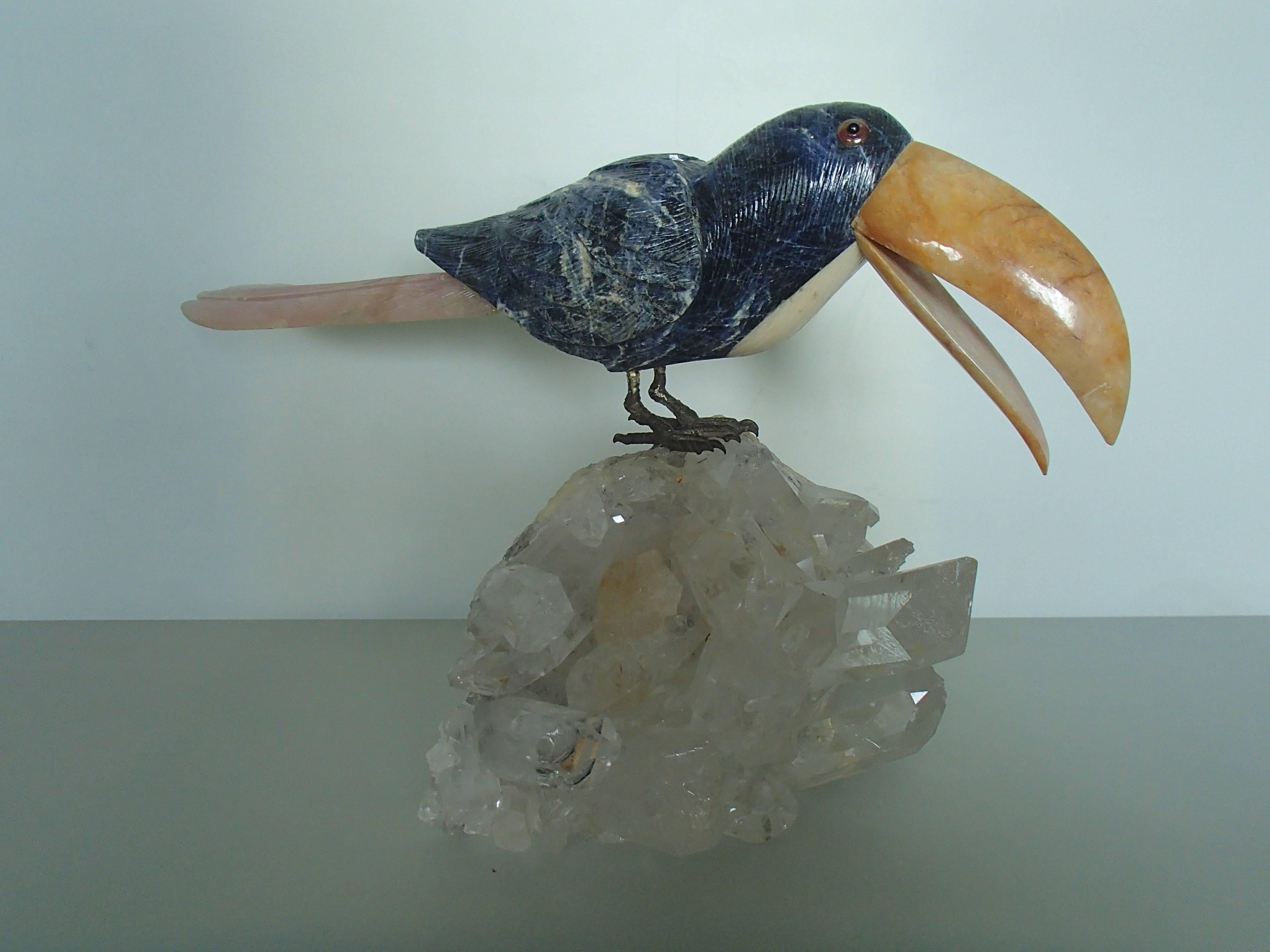 Modern Tucan Sitting on a Cristall Made of Sodalith and Rose Quarz For Sale