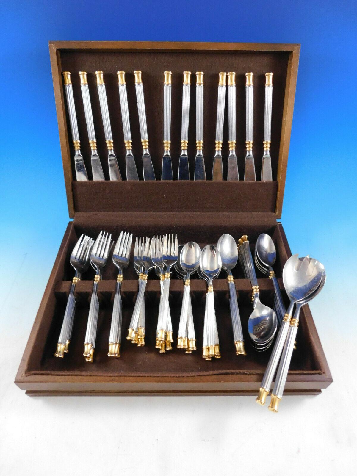 Tucano gold accent by Sasaki Japan estate stainless steel flatware set, 62pieces. This set includes:

12 knives, 8 3/4