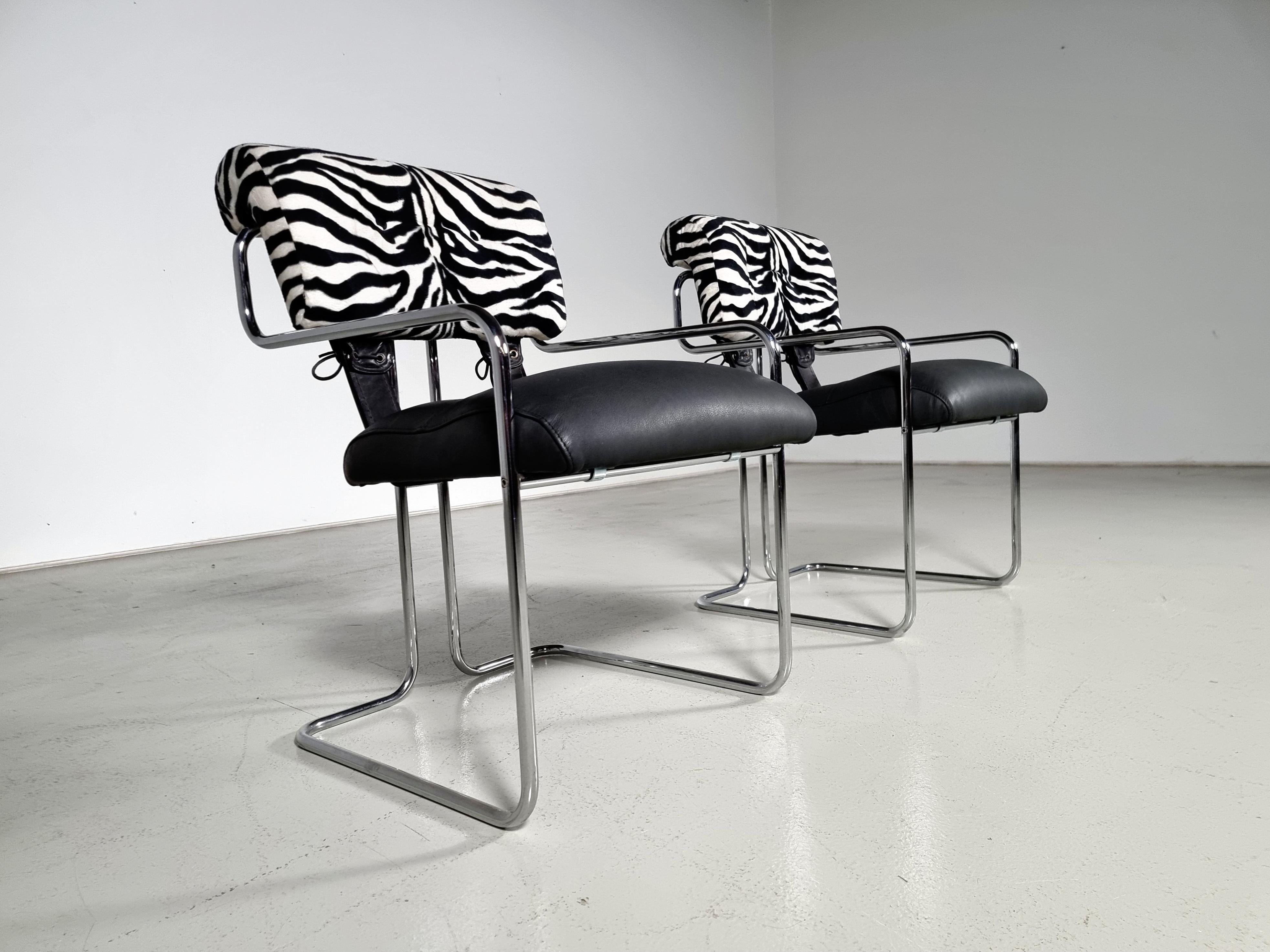 Late 20th Century Tucroma Chairs in black leather and zebra fabric, Guido Faleschini, Mariani For Sale