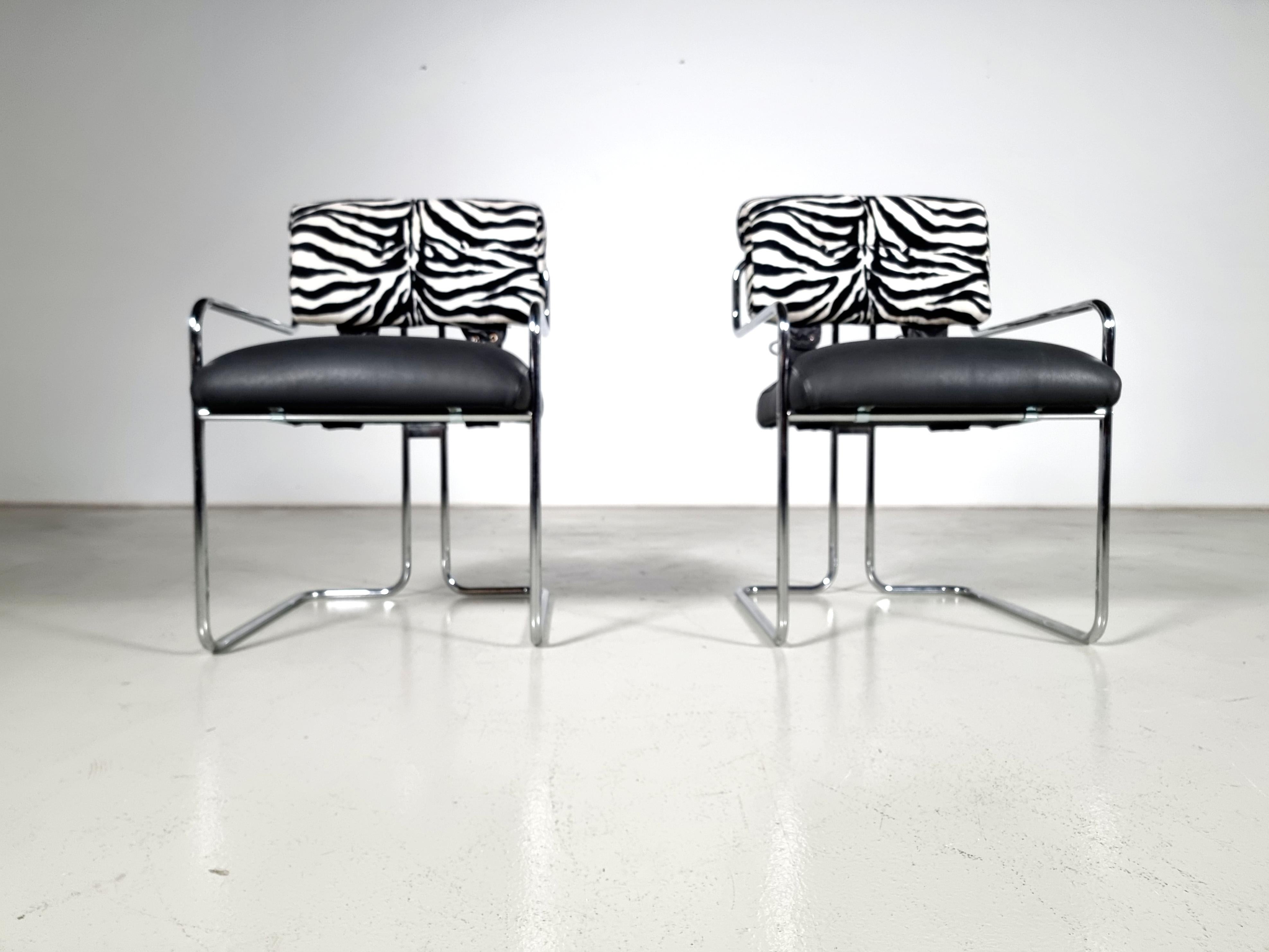 Steel Tucroma Chairs in black leather and zebra fabric, Guido Faleschini, Mariani For Sale