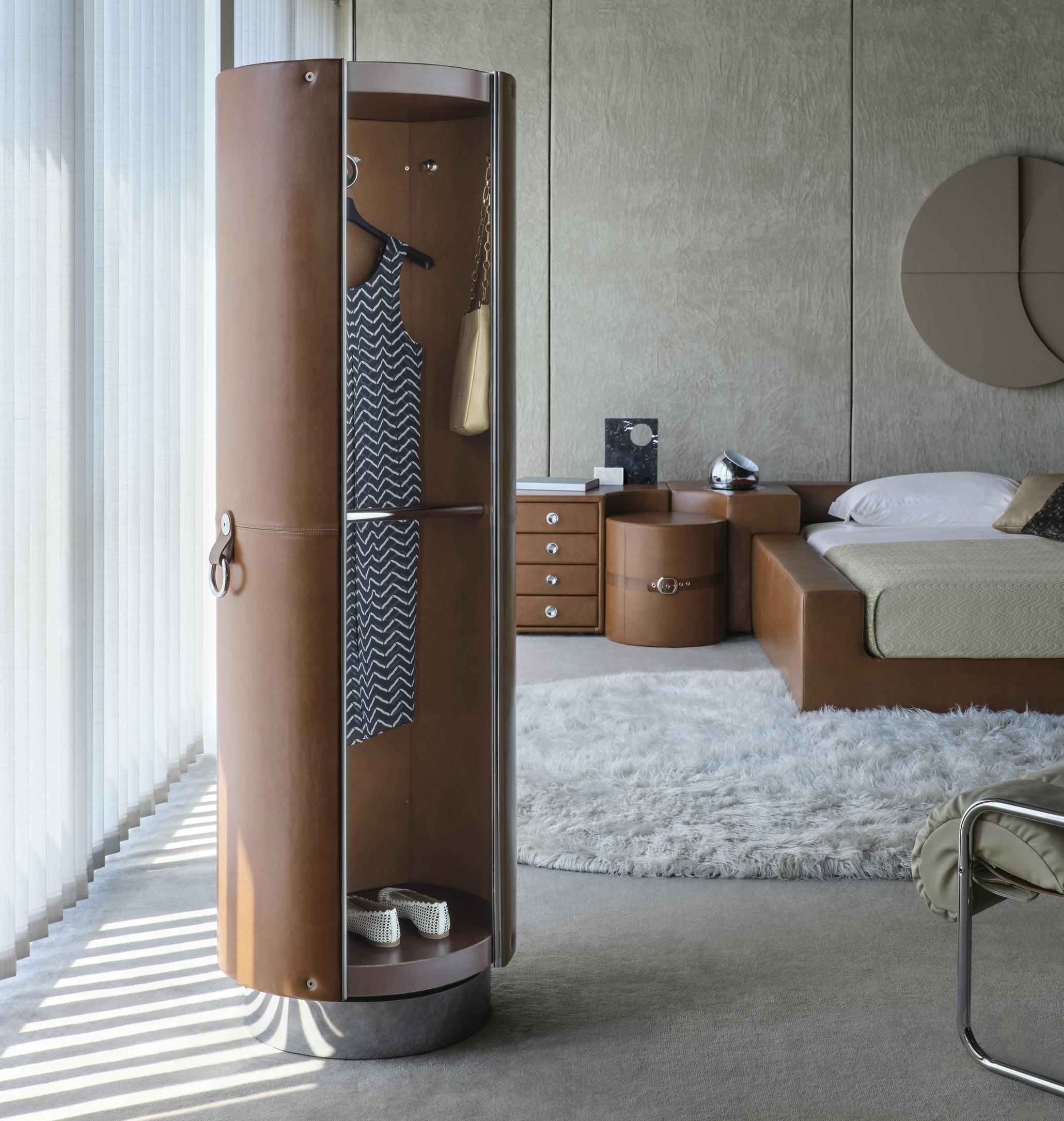 This 'Tucroma' leather rotating wardrobe was designed by Guido Faleschini in the 1970s and produced by i4Mariani (Italy). Custom colors and finishes are available. 

The Tucroma rotating armoire features a leather clad exterior with color