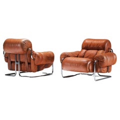 Tucroma lounge chairs (2) in cognac leather by Guido Faleschini for i4 Mariani