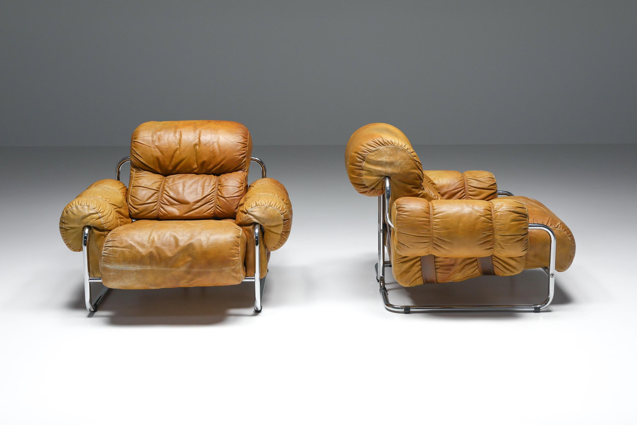 Guido Faleschini, Lounge chairs for Pace Collection; Italian design, 1975

Rare lounge chairs of the Tucroma series in leather and chrome metal. Icon piece from the 70s produced by Mariani
Elegant piece embodying the best Italian design has to