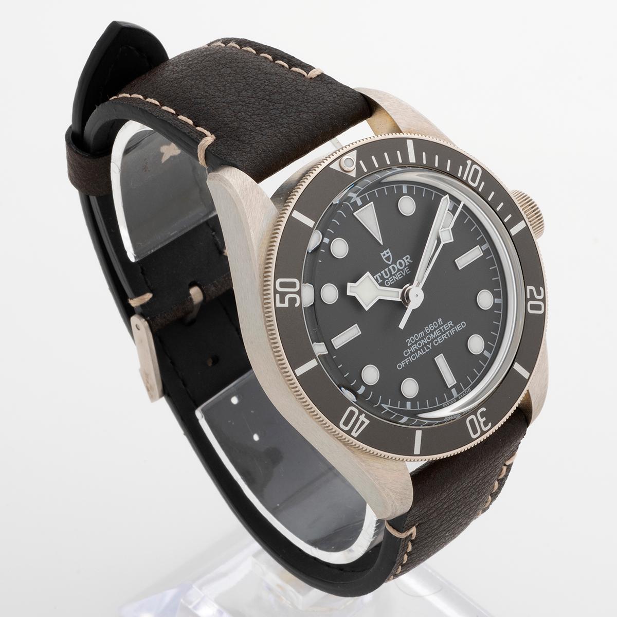 Our Tudor black bay 58 features a silver case (stamped 925) with taupe dial and bezel, with brown leather strap and silver tang buckle. Presented in near new condition, this reference 79010SG comes with inner and outer box user manual service