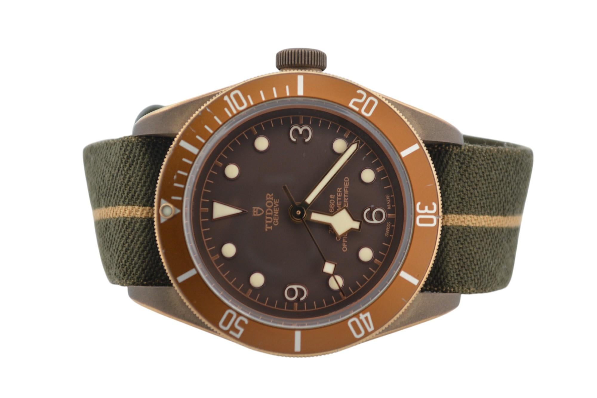The watch is in a very good condition and it’s working well. It shows slight signs of wear and scratches. The watch comes with an AGS Jewelry wooden box, along with an AGS Jewelry warranty card. For more information about delivery, warranty and