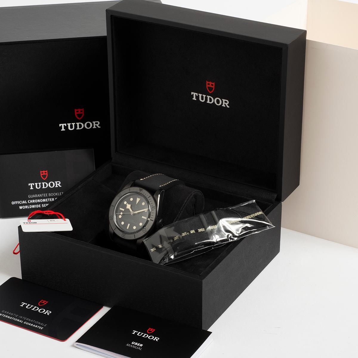 Our Tudor Black Bay ceramic reference 79210CNU features a 41mm black ceramic case with sapphire glass exhibition caseback and leather strap with deployant clasp. This ceramic Black Bay is presented in as new condition with little sign of use, the