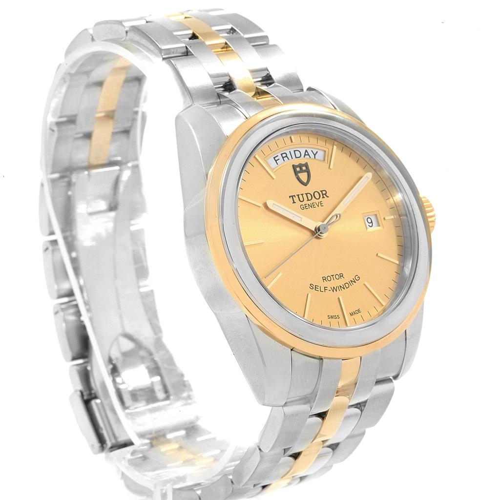 Tudor Glamour Day Date Steel Yellow Gold Mens Watch 56003. Automatic self-winding movement. Stainless steel and yellow gold round case 39.0 mm in diameter. Tudor logo on a crown. Stainless steel and yellow gold smooth fixed double bezel. Scratch