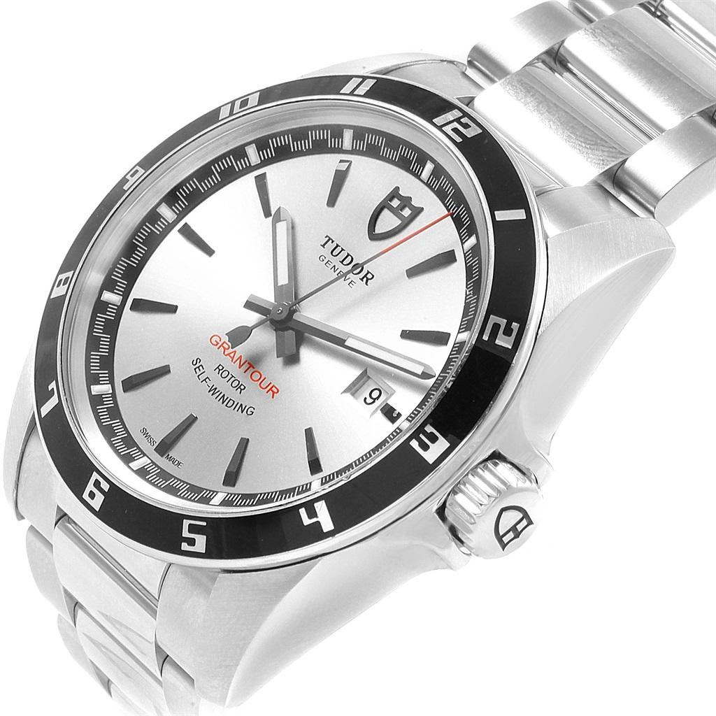 Tudor Grantour Silver Dial Steel Mens Watch 20500N Box Card. Automatic self-winding movement. Stainless steel oyster case 42.0 mm in diameter. Fixed black laquered stainless steel graduated bezel. Scratch resistant sapphire crystal. Silver dial with