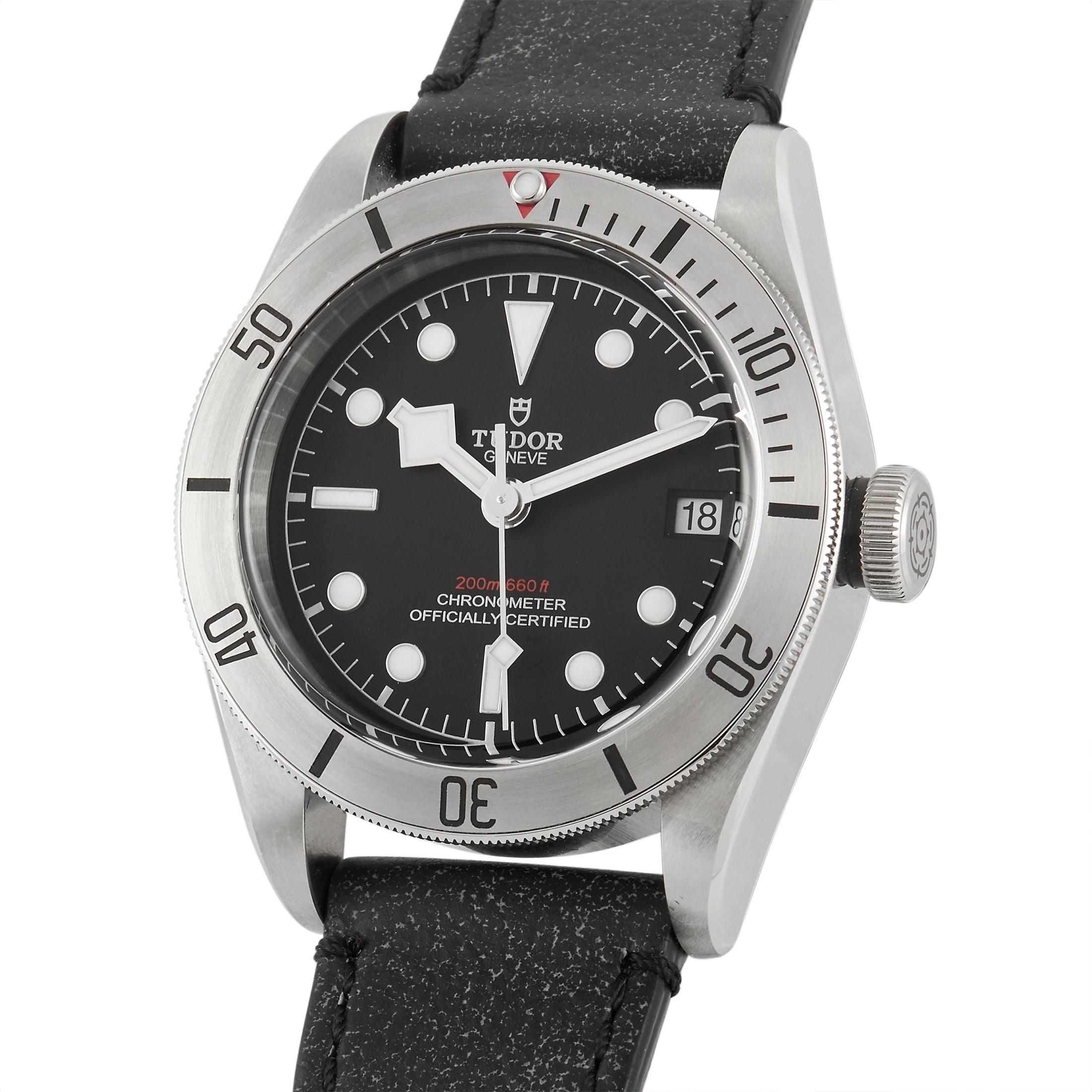 The Tudor Heritage Black Bay Watch, reference number 79730, is a sleek simple style that is ready to accompany you anywhere. 

The beauty of this minimalist design begins with its 41mm round stainless steel case. Black minute markings accent the