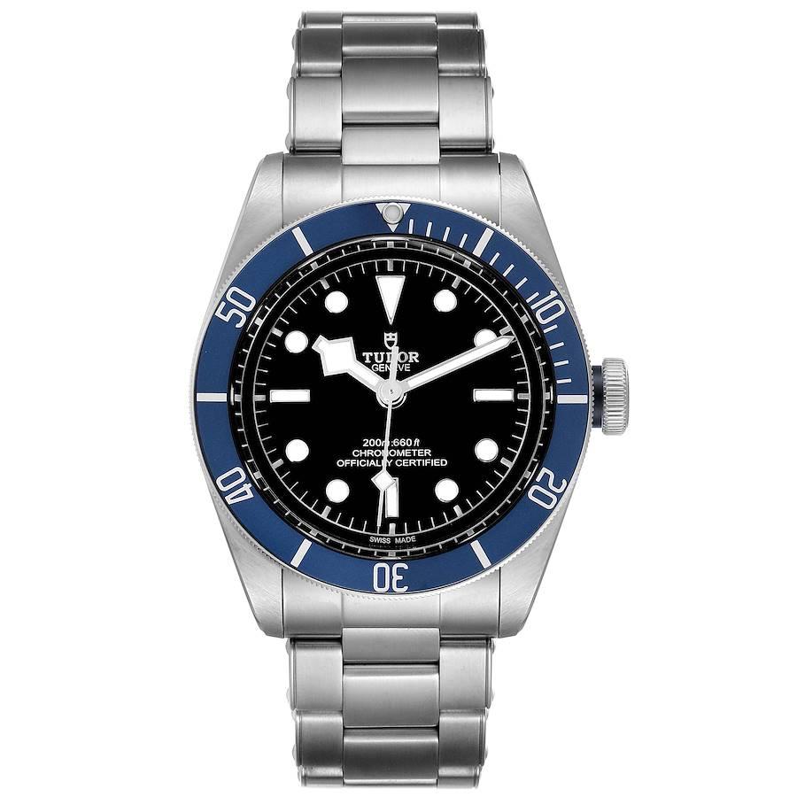 Tudor Heritage Black Bay Blue Bezel Steel Mens Watch 79230B Box Card. Automatic self-winding movement. Stainless steel oyster case 41.0 mm in diameter. Tudor logo on a crown. Blue special time-lapse unidirectional rotating bezel. Scratch resistant
