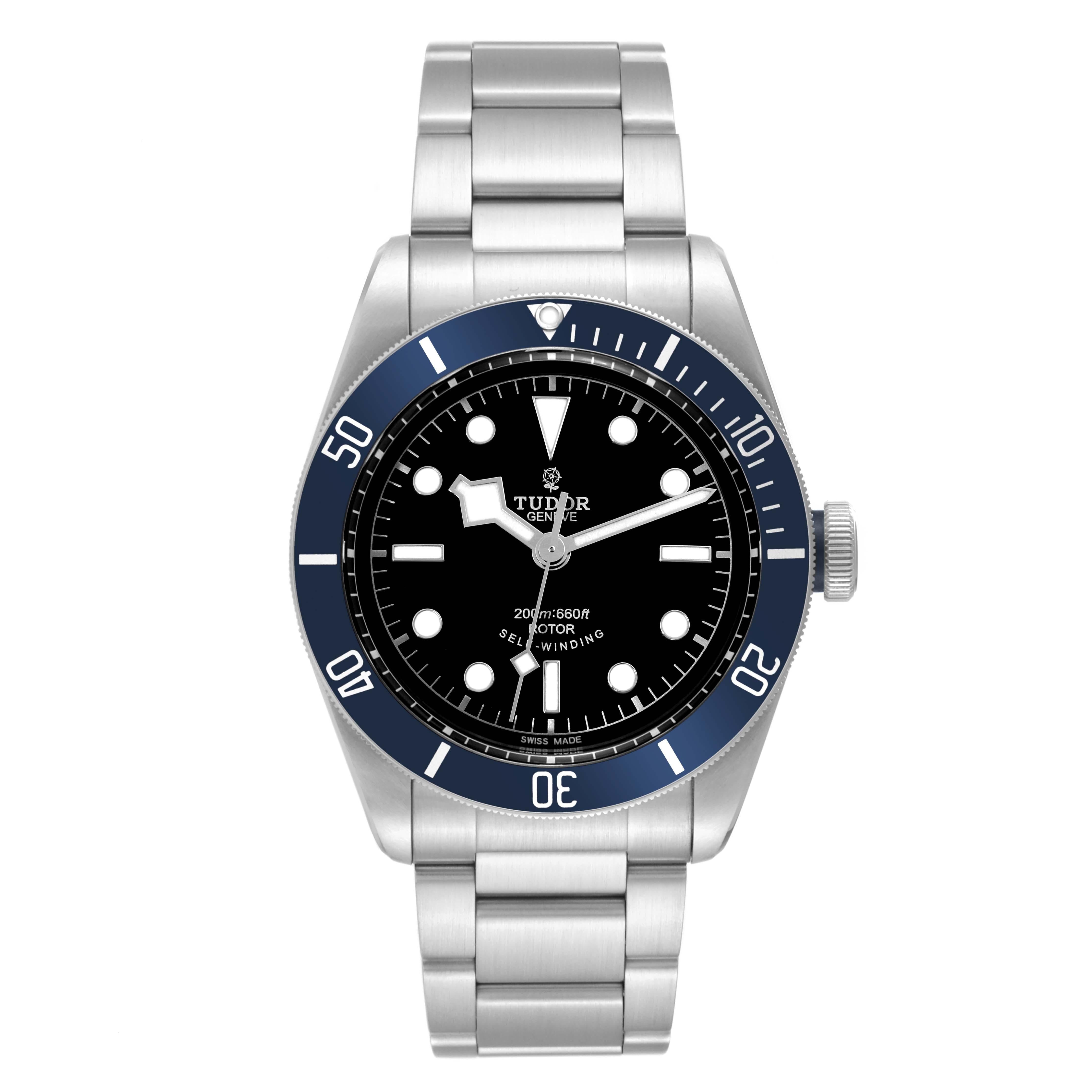 Tudor Heritage Black Bay Blue Bezel Steel Watch 79220B Box Card. Automatic self-winding movement with chronograph function. Stainless steel oyster case 41.0 mm in diameter. Tudor logo on crown. Blue unidirectional rotating tachymeter bezel. Scratch
