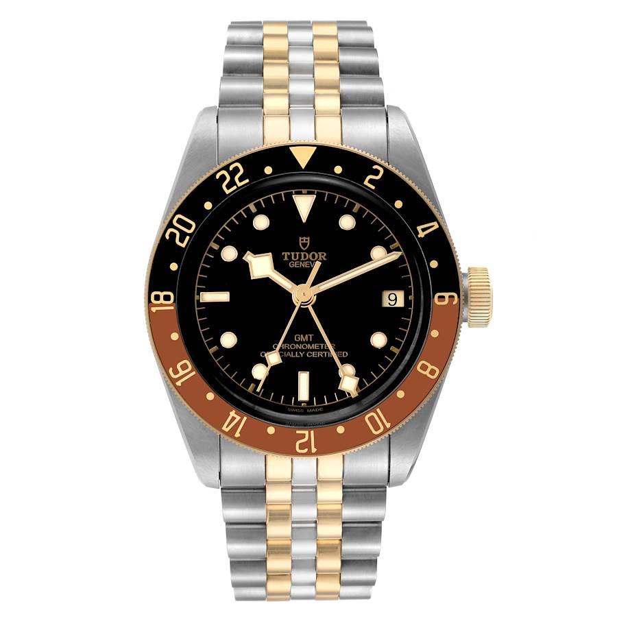 Tudor Heritage Black Bay GMT Steel Yellow Gold Mens Watch 79833MN Box Card. Automatic self-winding movement. Stainless steel oyster case 41.0 mm in diameter. Tudor logo on a crown. Bi-directional rotating black and brown (rootbeer) bezel. Scratch