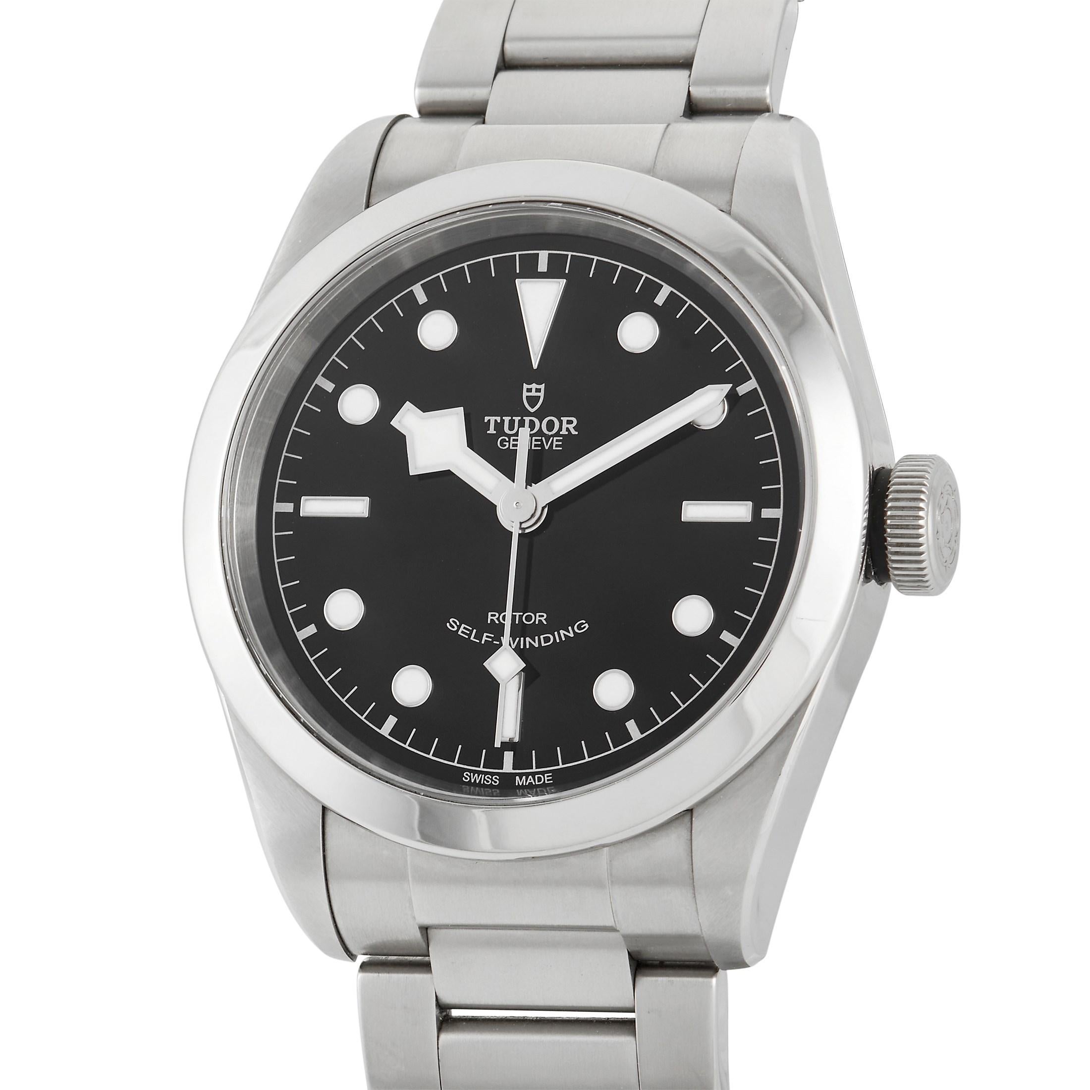The Tudor Heritage Black Bay Watch, reference number 79540, maintains a bold, straightforward sense of style. 

This stately timepiece features a stainless steel case, a stainless steel bracelet, and a fixed smooth stainless steel bezel. On the bold