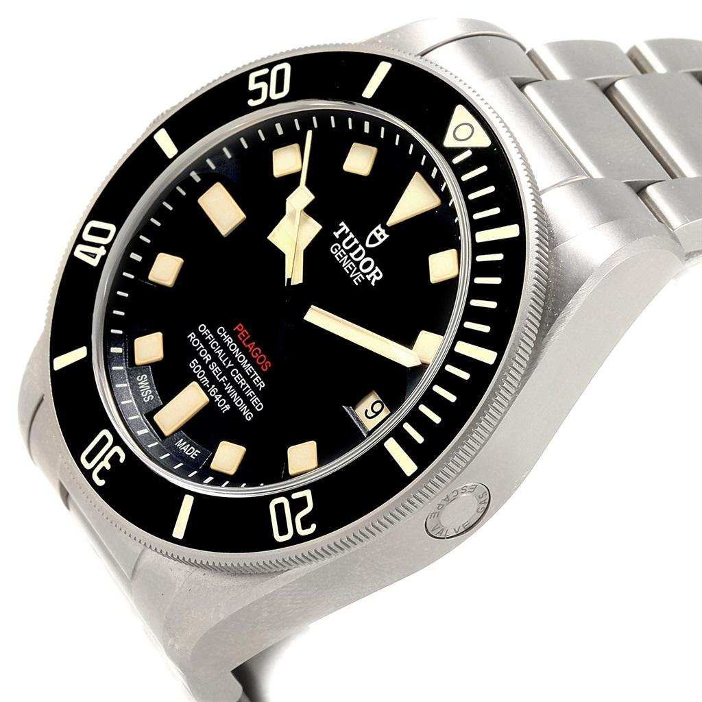 Tudor Pelagos 42mm LHD Titanium Steel Mens Watch 25610. Automatic self-winding movement. Titanium and steel case 42 mm in diameter. Tudor logo on a crown. Pointed crown guards. Unidirectional rotating 60 minute graduated bezel with black ceramic