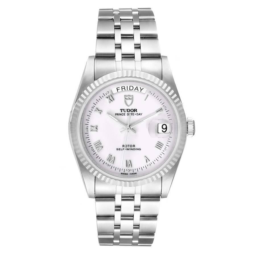 Tudor Prince Day Date White Roman Dial Steel Mens Watch 76214 Box Card. Automatic self-winding movement. Stainless steel round case 36.0 mm in diameter. Tudor logo on a crown. White gold fluted bezel. Scratch resistant sapphire crystal. White dial