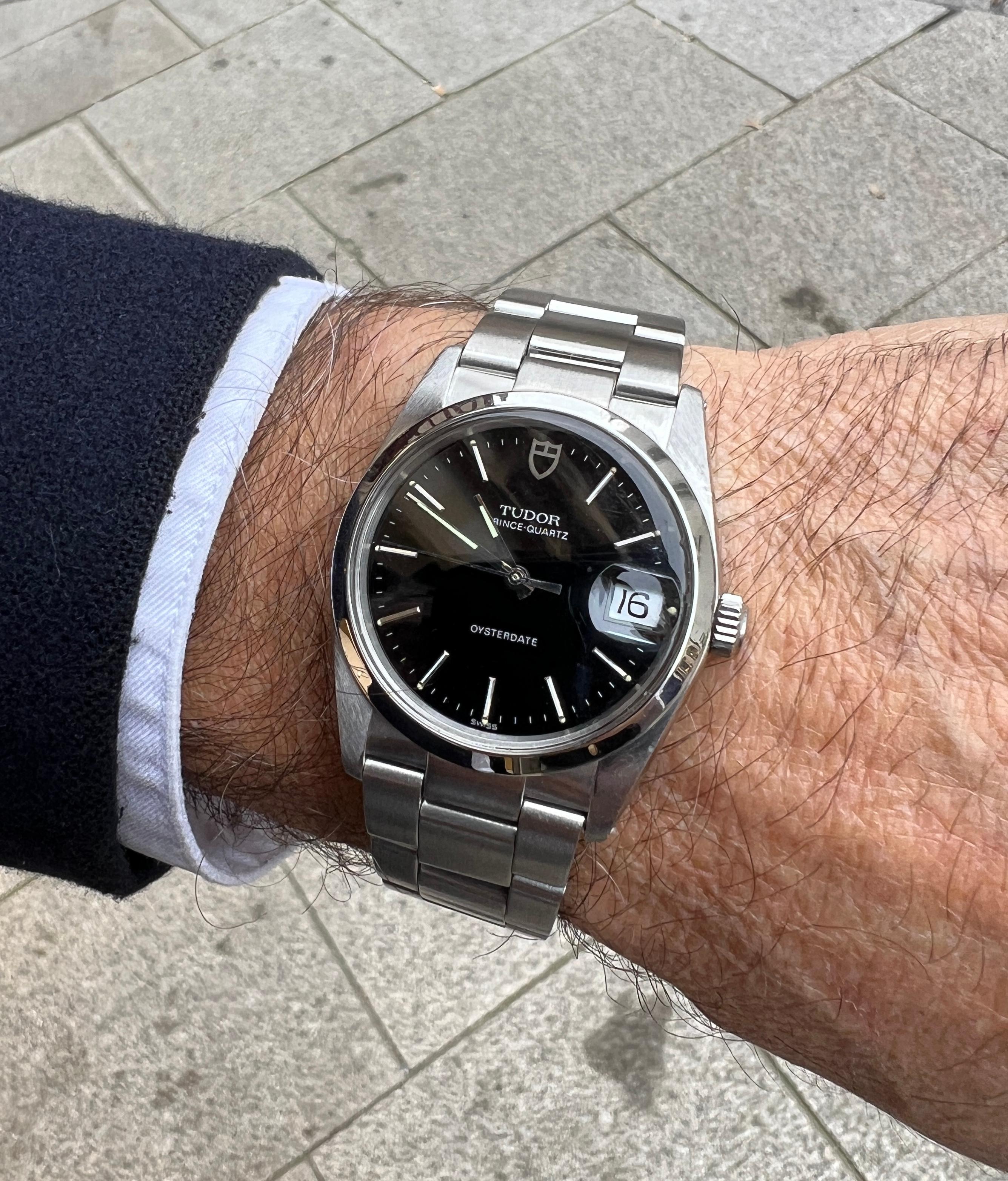 Tudor Prince Oysterdate Watch

Gender: Unisex (for men and women)  

- Case: Stainless steel  
- Engraved Reference: 91520N (interior marked 91520M)  
- Serial Number: 16XX93  
- Dial:Deep black with an elegant finish  
- Details: Precise markings
