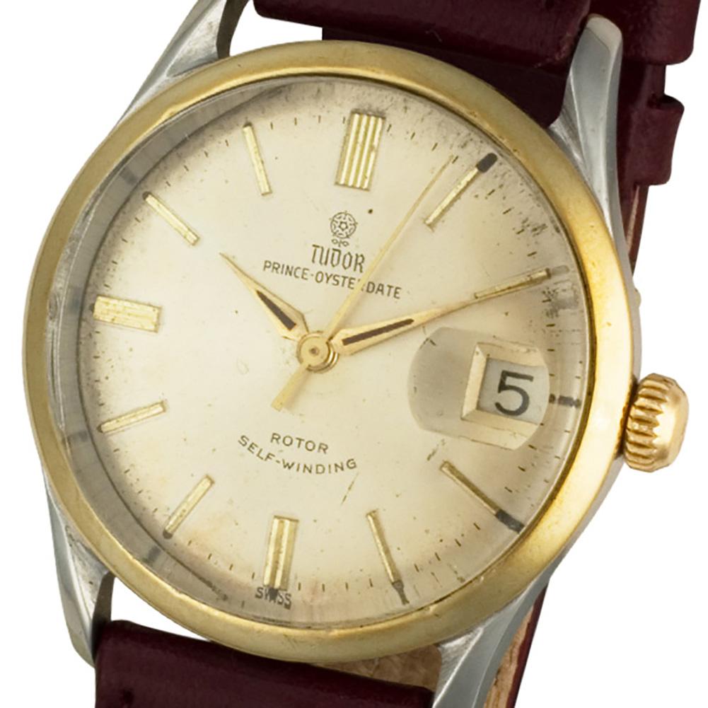 Tudor Prince in Gold und Edelstahl an einem Lederband. Auto mit Datum. Ref 7968. Fine Pre-owned Tudor Uhr.

Certified preowned Tudor Prince 7968 Uhr ist aus Edelstahl auf einem Lederband mit einem 18k Gelbgold Zwei Stück Schnalle gemacht. Diese