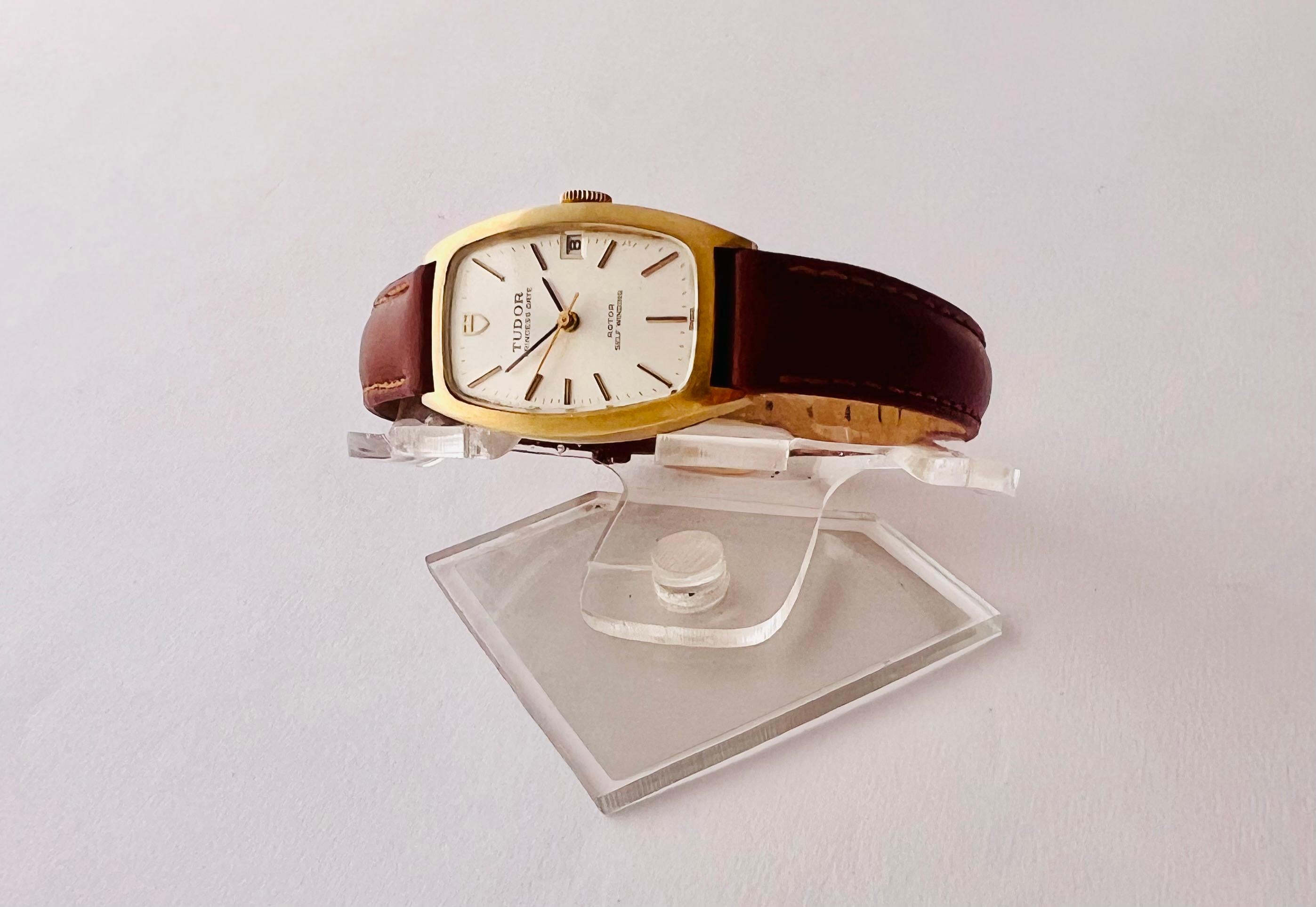 Brand : Tudor

Model: Princess Date  

Country Of Manufacture: Switzerland

Movement: Automatic Hand Wind

Case Material: 18K Solid Yellow Gold

Measurements : 21mm diameter (excluding crown ) x 32 mm

Band Type : Brown Genuine Leather

Band