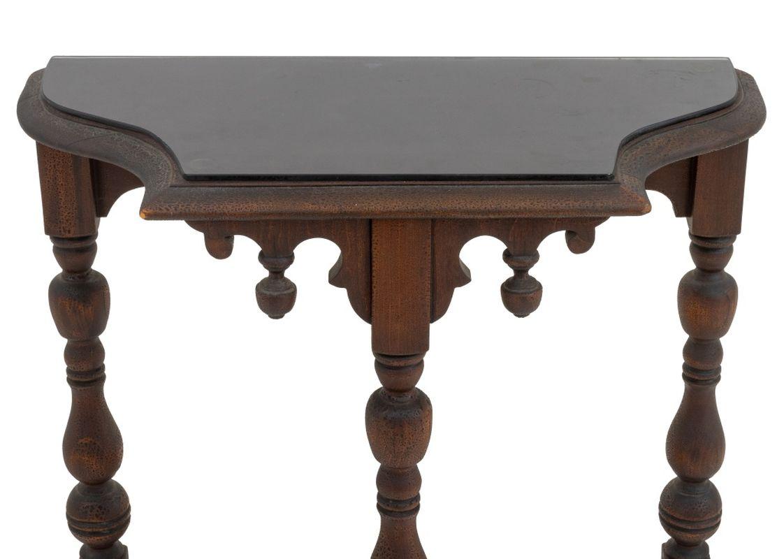 Tudor Revival Turned Wood Accent Table, circa 1920, with three legs and fitted glass top. 22