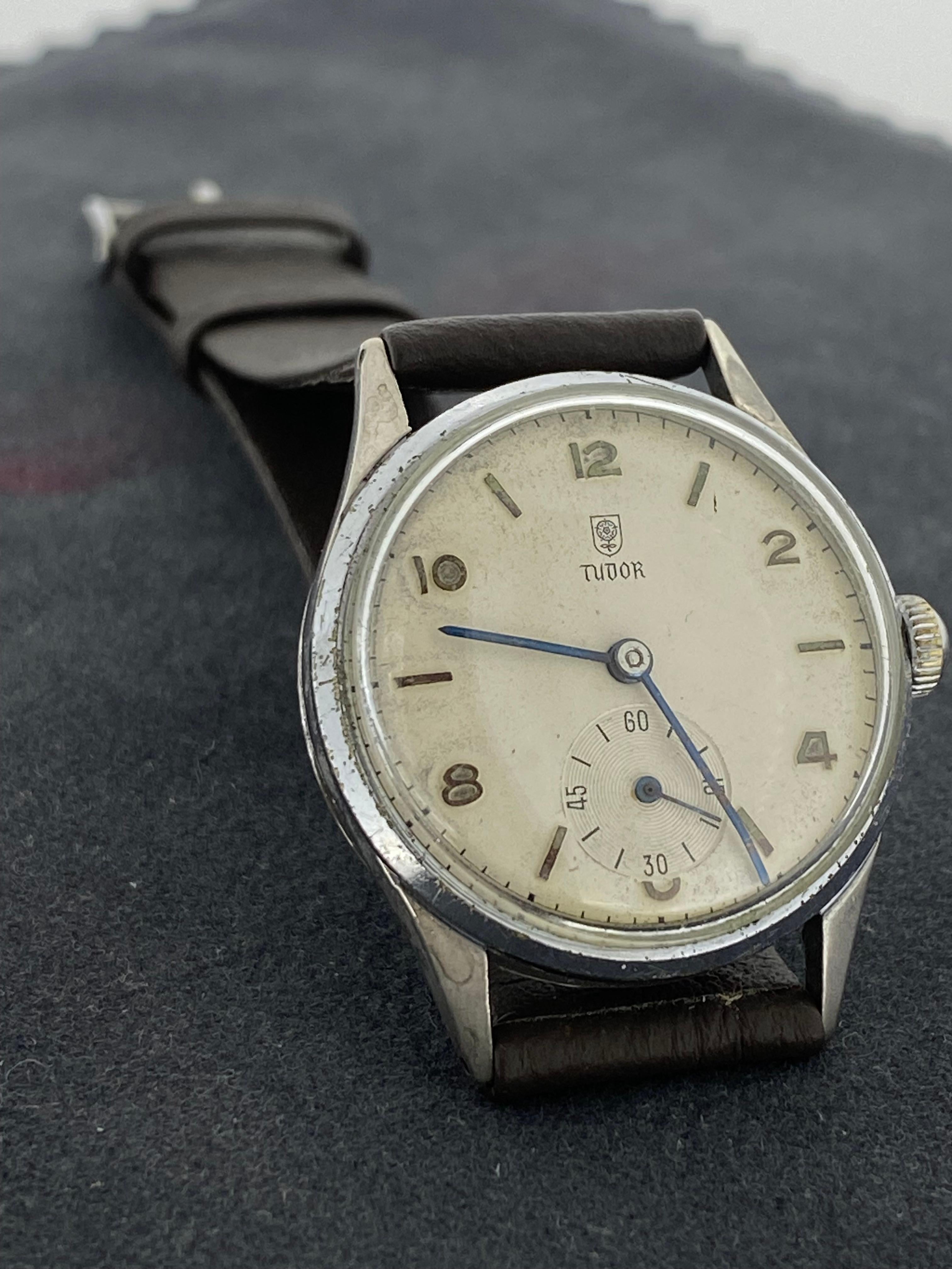 This Tudor Rolex Vintage Gents’ Watch is dating from 1960’s,
it is in good working order & in overall good original condition

An ivory-beige coloured Dial is adorned with brand’s iconic 
Tudor Rose logo, which sits at the 12 o’clock position. 
Dial