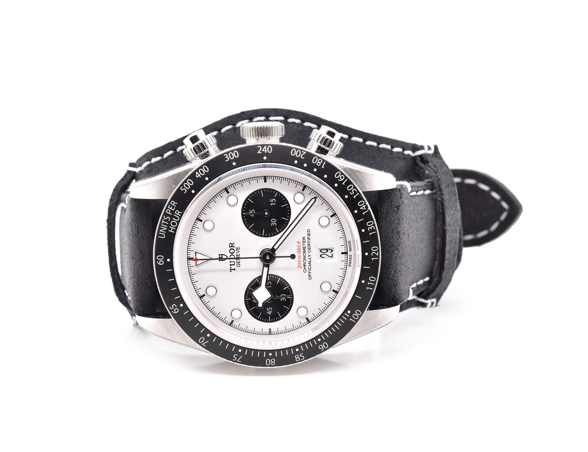 Movement: automatic
Function: chronograph, hour, minute, small second, power reserve
Case: round 41mm stainless steel case, screw-down crown, sapphire protective crystal, black tachymeter bezel
Dial: white luminous dot dial
Band: Tudor black fabric