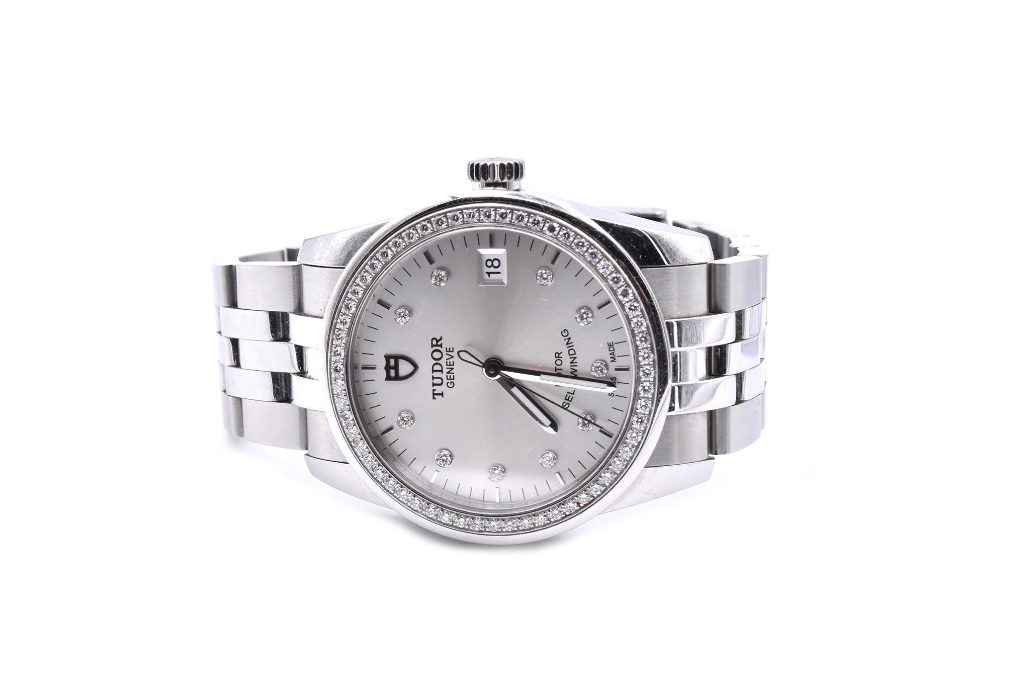 Movement: automatic
Function: hours, minutes, seconds, date
Case: round 36mm stainless steel case with a diamond bezel, screw-down crown, sapphire protective crystal
Dial: silver diamond dial, white luminescent hands,  silver sticks
Band: stainless