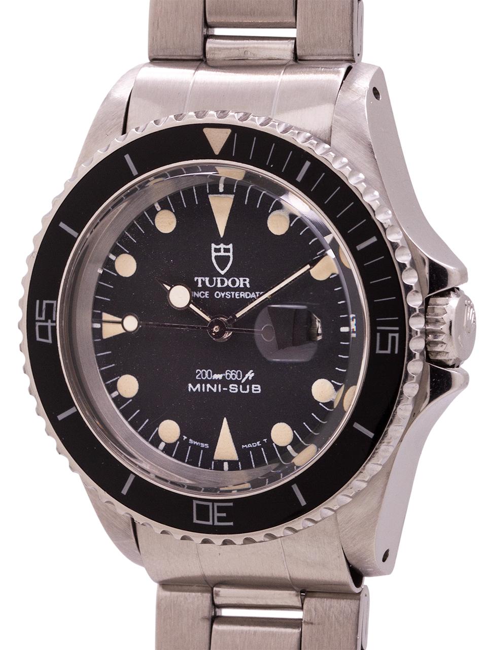 
Tudor Mini-Sub ref 9440 serial #169,xxx circa 1985. 33 x 39mm stainless steel case with black elapsed time bezel and acrylic crystal. Original matte black dial with slightly aged luminous indexes and hands. Dial signed with Tudor Shield, Tudor