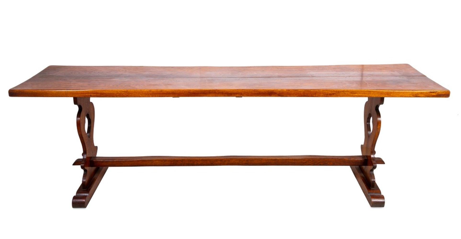 Tudor Style Oak Refectory Table, 20th century, the plank top above vase shaped end-standards, joined by a central stretcher. 29.5