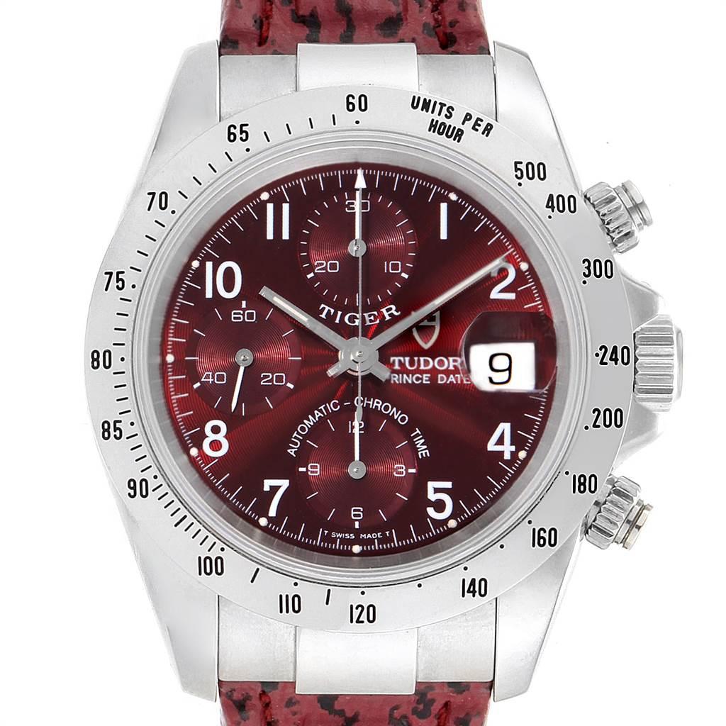 Tudor Tiger Woods Chronograph Burgundy Dial Steel Mens Watch 79280P. Automatic self-winding movementwith chronograph function. Stainless steel oyster case 40.0 mm in diameter. Tudor logo on a crown. Stainless steel tachometer bezel. Scratch