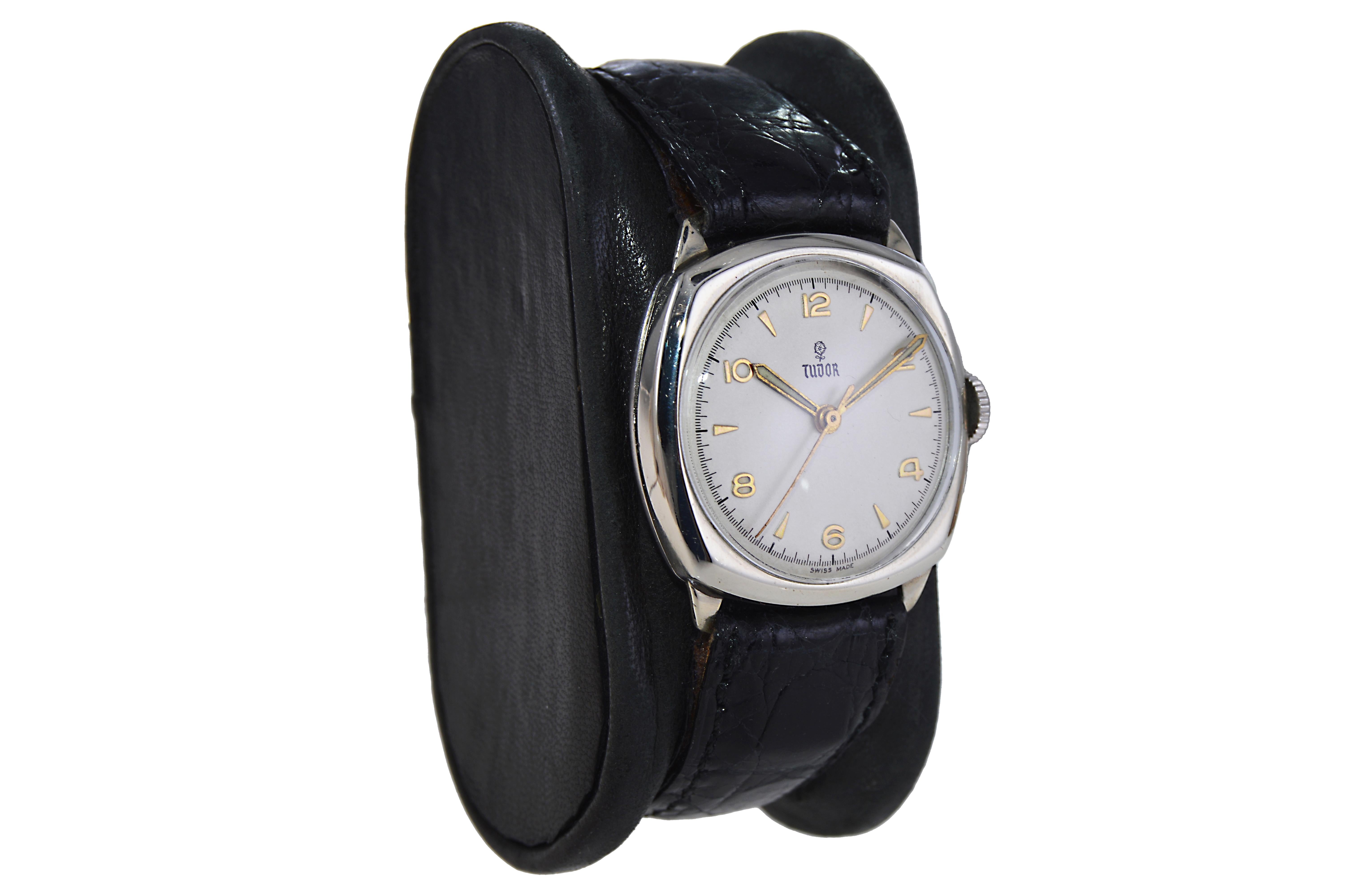 FACTORY / HOUSE: Tudor Watch Company
STYLE / REFERENCE: Cushion Shape  
METAL / MATERIAL: Nickel
DIMENSIONS: Length 31 mm X  Width 29 mm
CIRCA: 1940's
MOVEMENT / CALIBER: Manual Winding / 17 Jewels / Caliber Font 
DIAL / HANDS: Silvered with Gilt