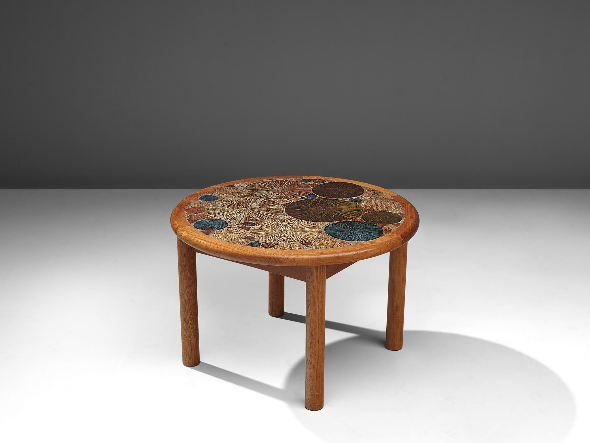 Tue Poulsen for Haslev Møbelsnedkeri, ceramic multicolored coffee table, ceramics and oak, Denmark, 1963.

This coffee table with a top with ceramic tile inlay is the ultimate symbiose between art and furniture. Multi-color textured tiles were
