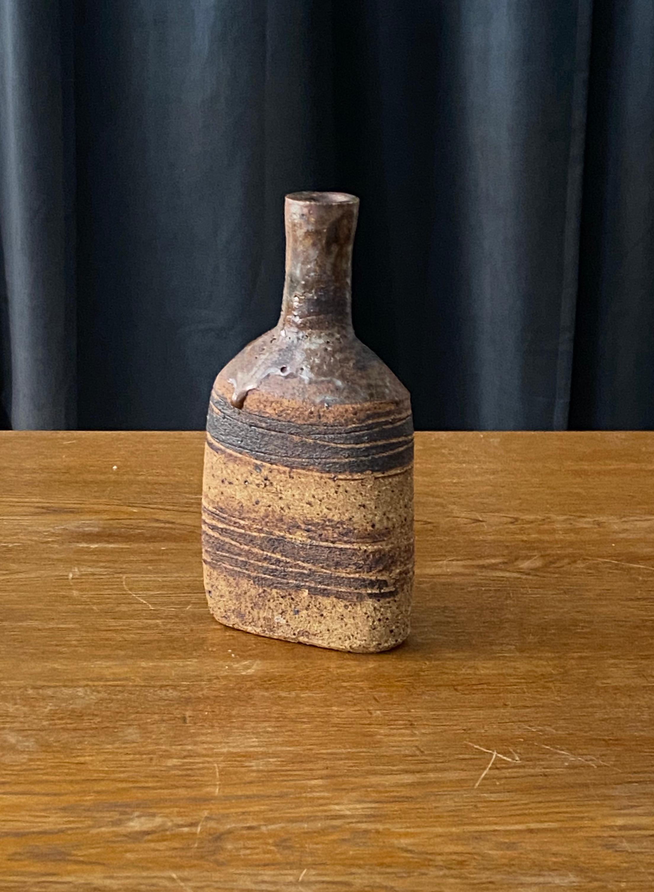 A small handmade vase or vessel. Designed and produced by Tue Poulsen, Denmark, 1960s. 

Other ceramicists of the period include Axel Salto, Arne Bang, Wilhelm Kåge, and Berndt Friberg.