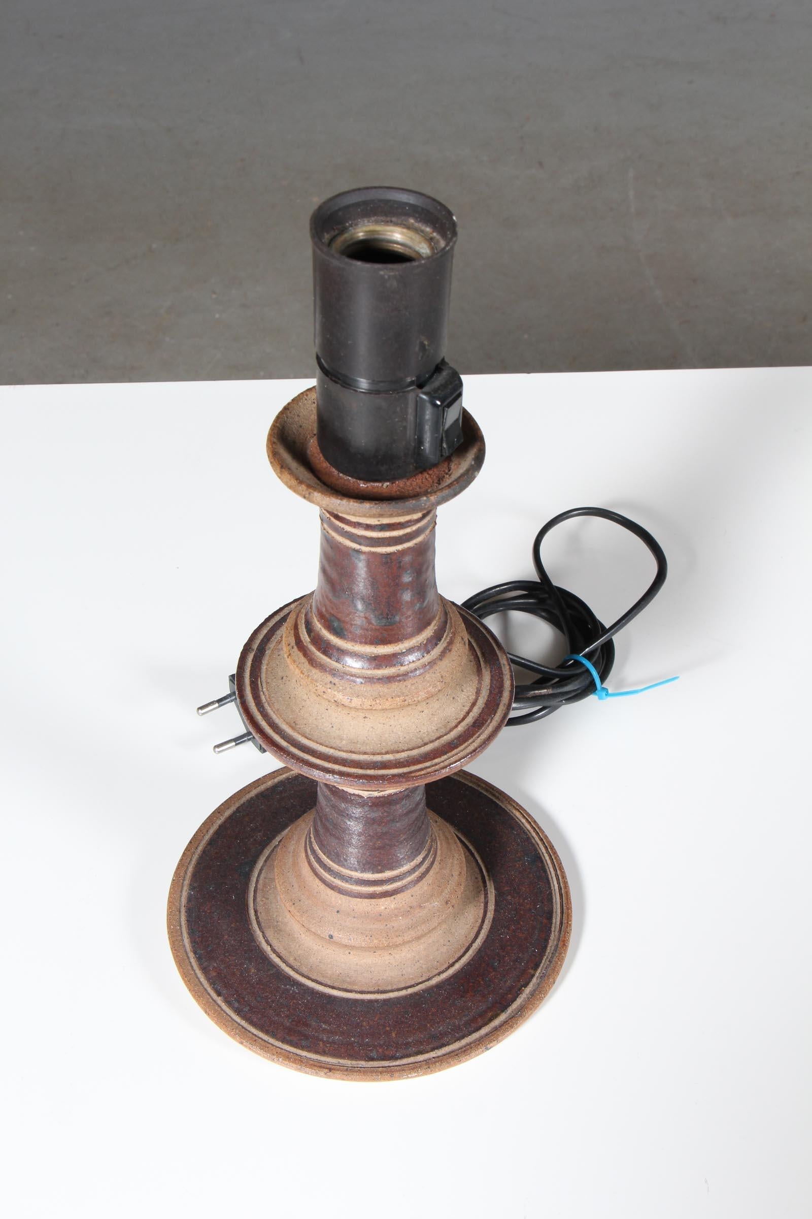 Tue Poulsen stoneware table lamp.

H. 31/24.