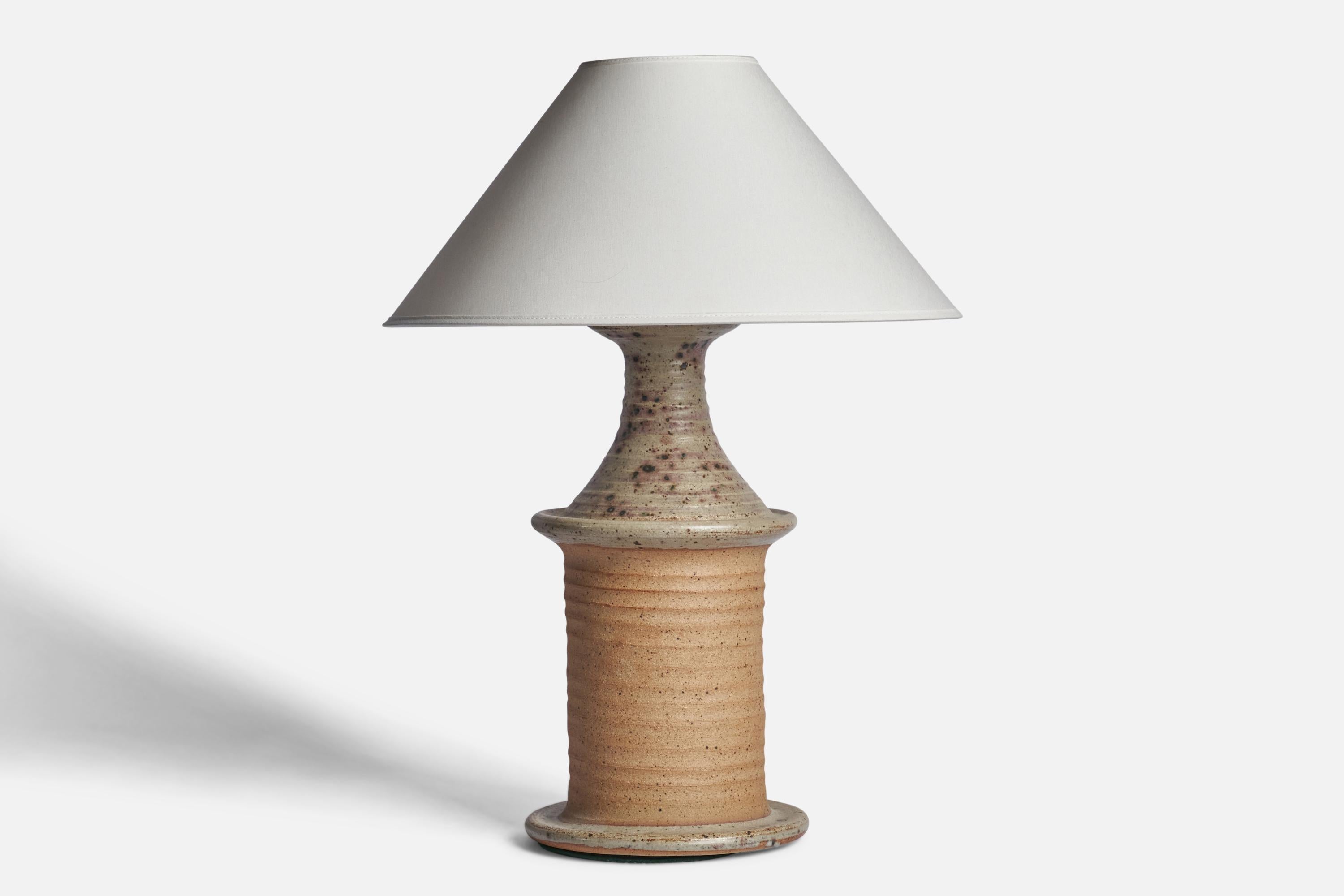 A grey and beige-glazed stoneware table lamp designed and produced by Tue Poulsen, Denmark, 1970s.

Dimensions of Lamp (inches): 16.5