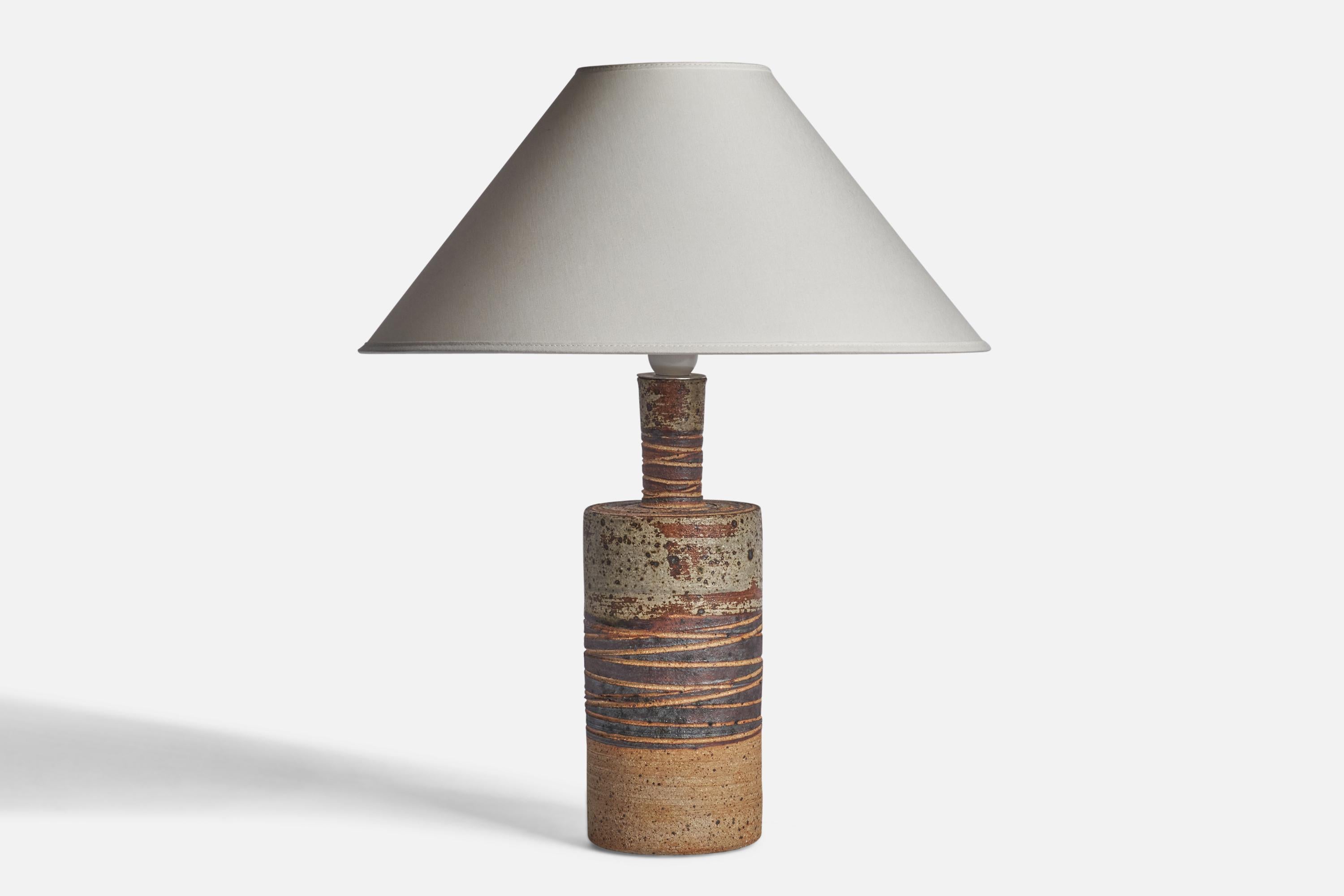 A grey and brown-glazed stoneware table lamp designed and produced by Tue Poulsen, Sweden, 1960s.

Dimensions of Lamp (inches): 14.7” H x 4.45