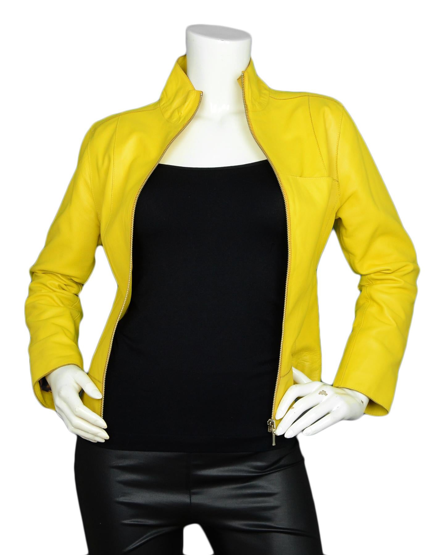 Tufi Duek Yellow Leather Front Zip Jacket 

Made In: Brazil 
Color: Yellow
Materials: 100% Leather
Lining: 100% Acetate
Opening/Closure: Front zip
Overall Condition: Excellent pre-owned condition
Tag Size: IT40 *Please refer to measurements to