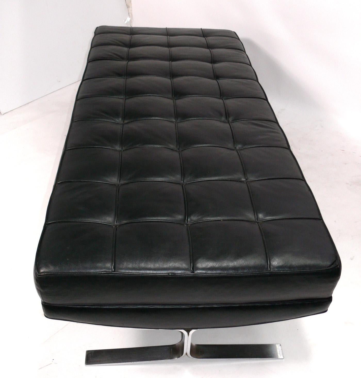 Clean Lined Tufted Black Leather and Satin Chrome Leg Bench, attributed to Nicos Zographos, unsigned, American, circa 1960s. The leather has been cleaned and conditioned. 