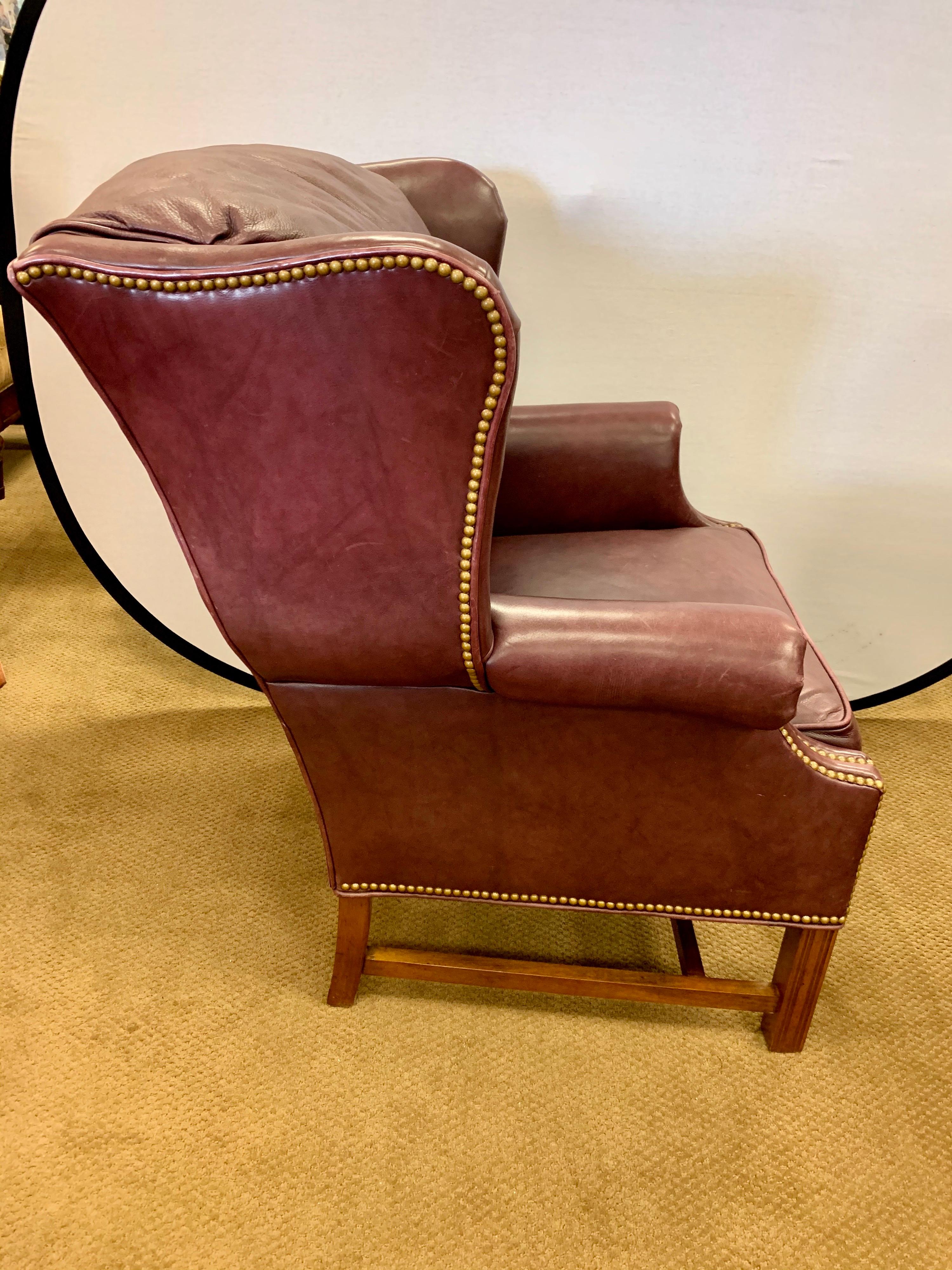 Brass Tufted Burgundy Leather Pair of Bernhardt Nailhead Wingback Library Chairs