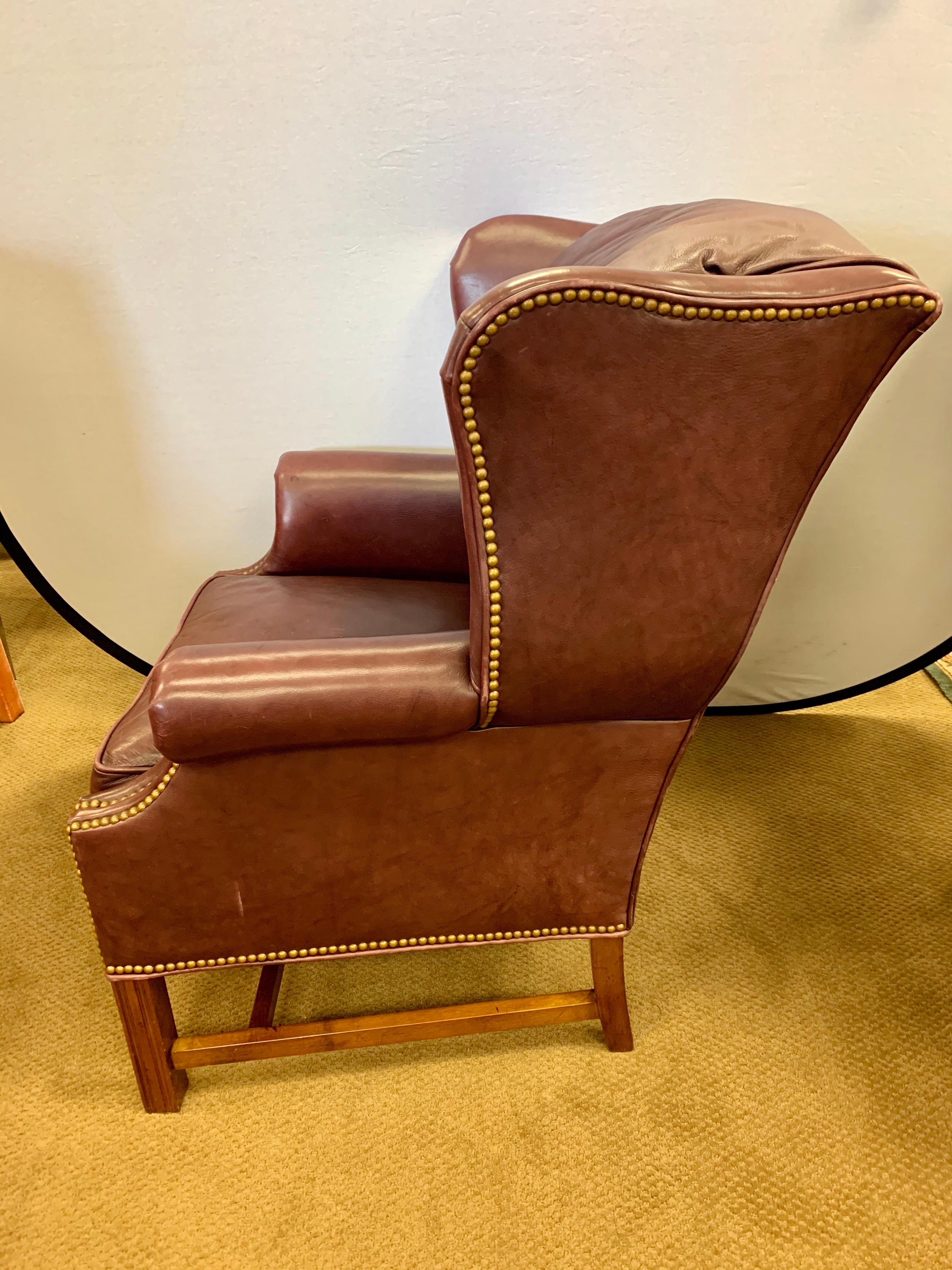 Tufted Burgundy Leather Pair of Bernhardt Nailhead Wingback Library Chairs In Good Condition In West Hartford, CT