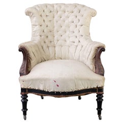 Tufted French Armchair with Carved Details