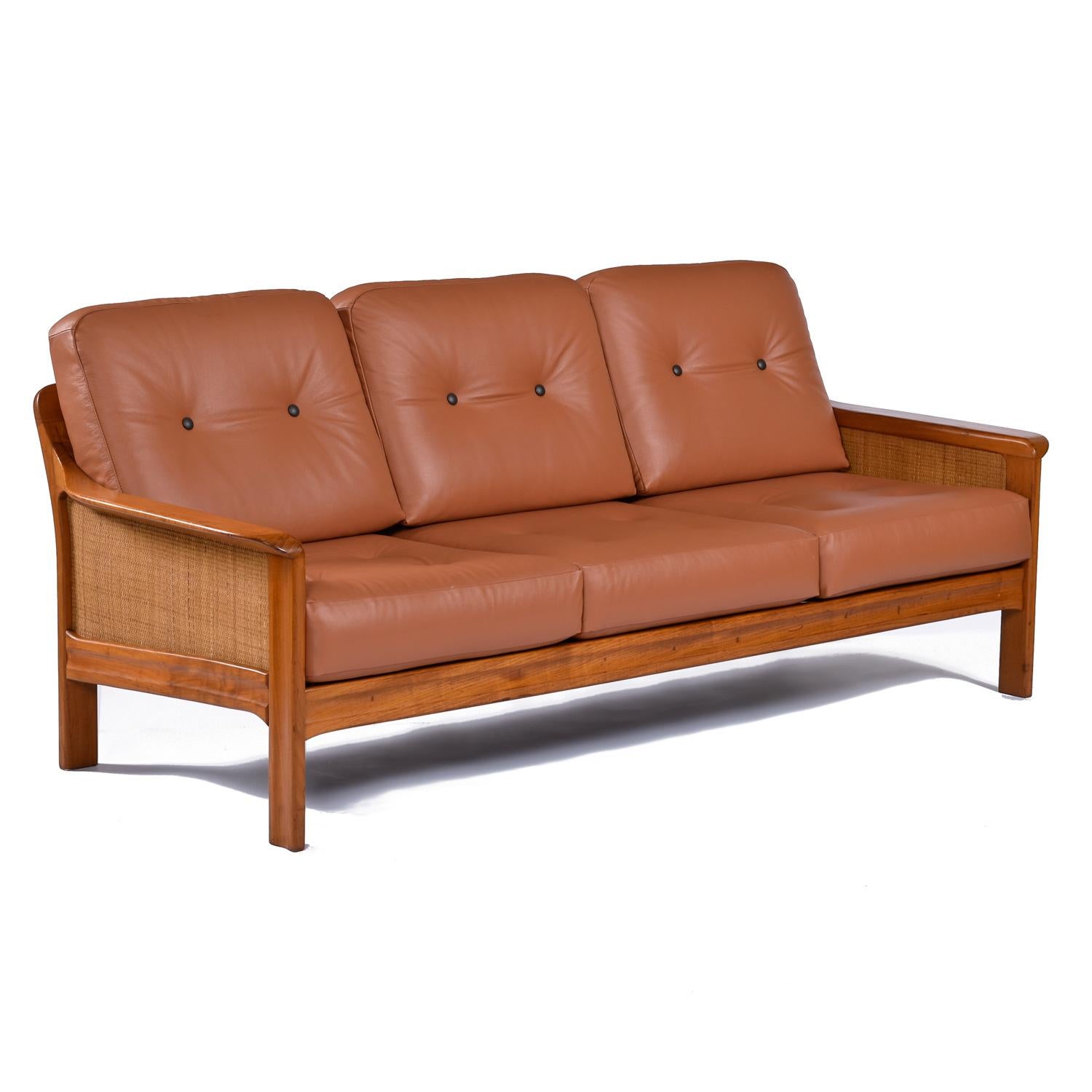 Sold as a 3-piece set.   All 3 pieces have been restored with new leather, but the chairs and sofa were upholstered in slightly different colored leather.  As you can see from the pics, the sofa is more of a reddish cognac.  The chairs are a