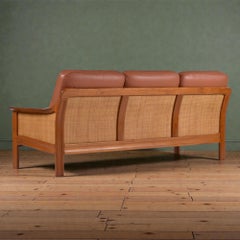Tufted Leather Balinese Style Danish Modern Solid Teak and Cane Sofa