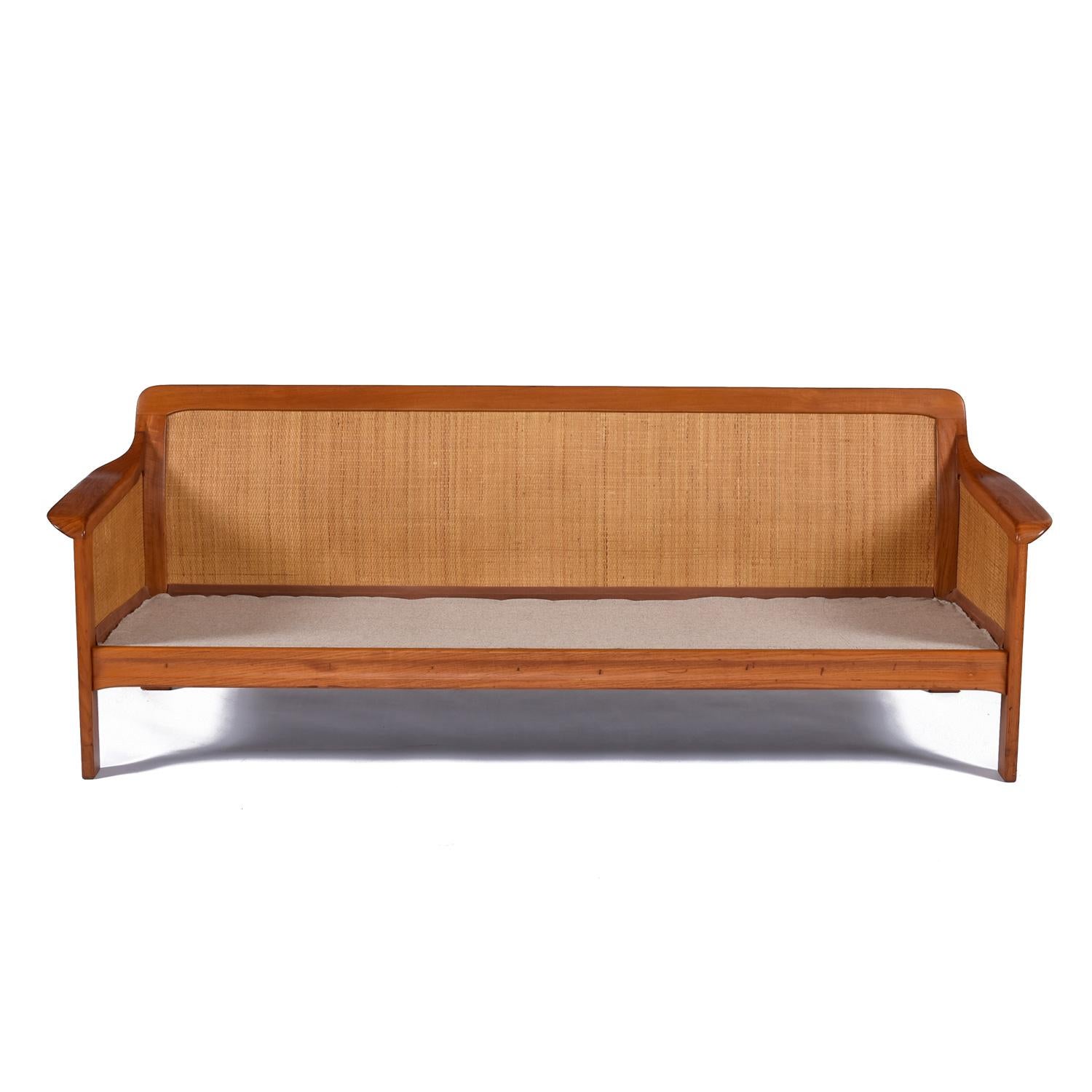 Late 20th Century Tufted Leather Balinese Style Danish Modern Solid Teak and Cane Sofa For Sale